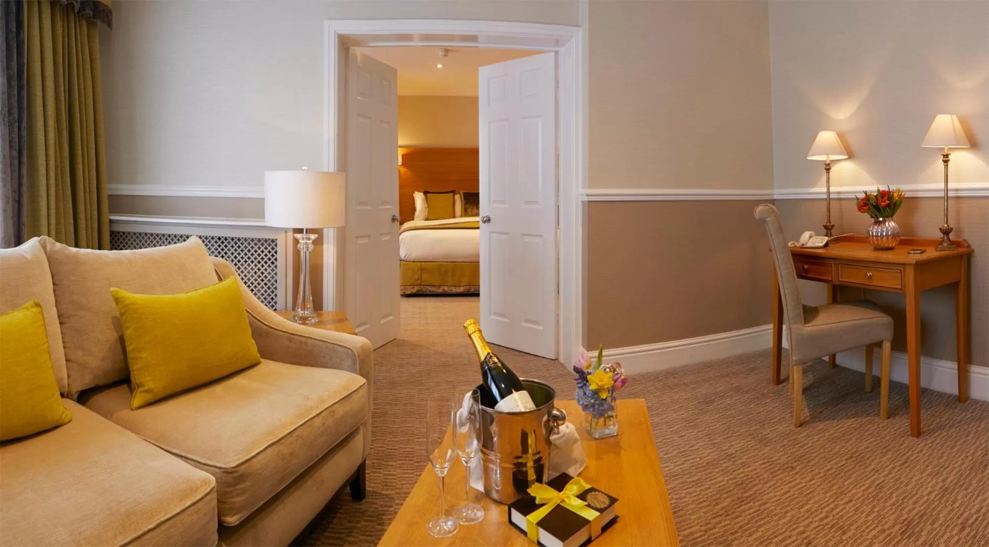 Seating area, Bed in Palm Court Hotel