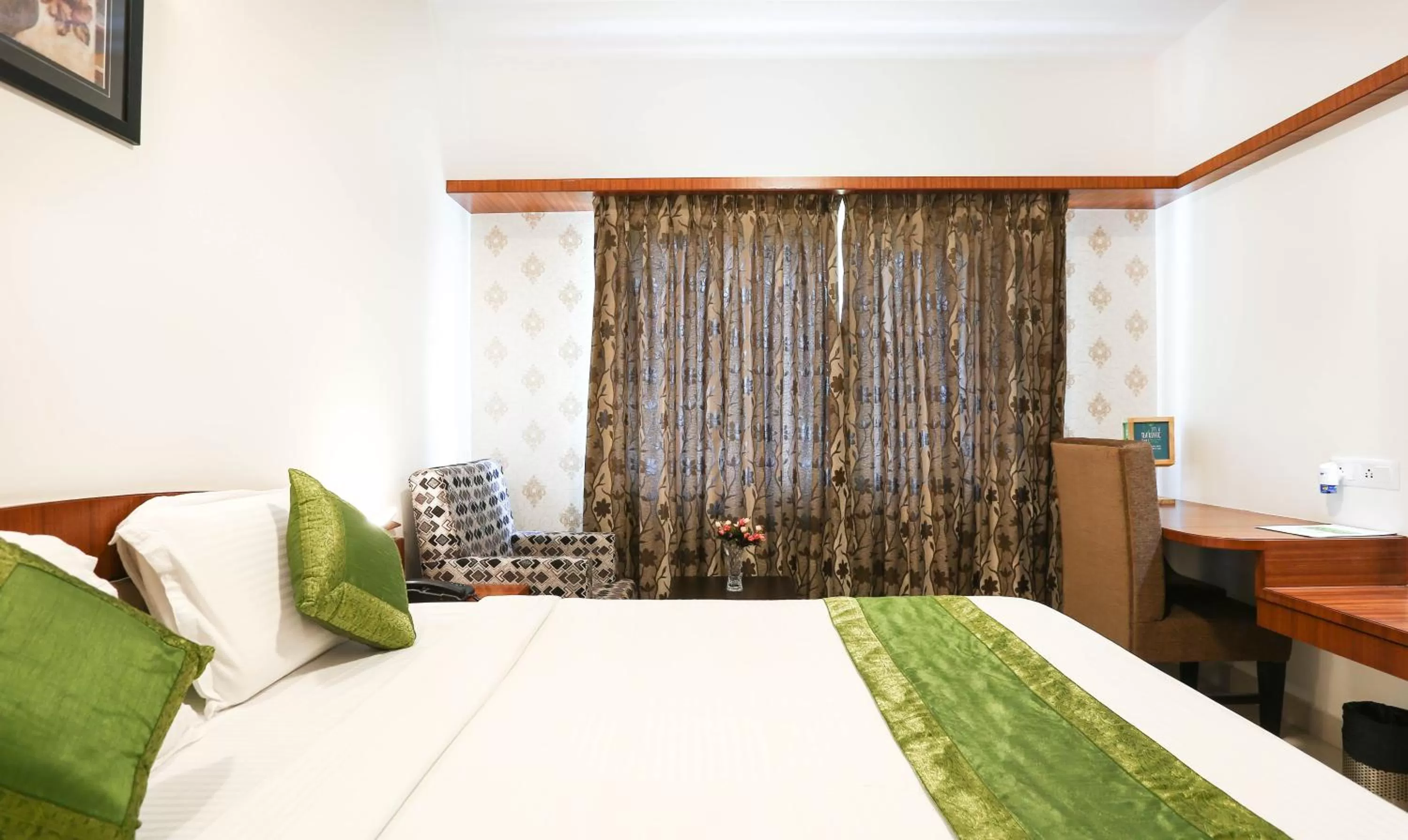 Bedroom, Bed in Treebo Premium Akshaya Mahal Inn