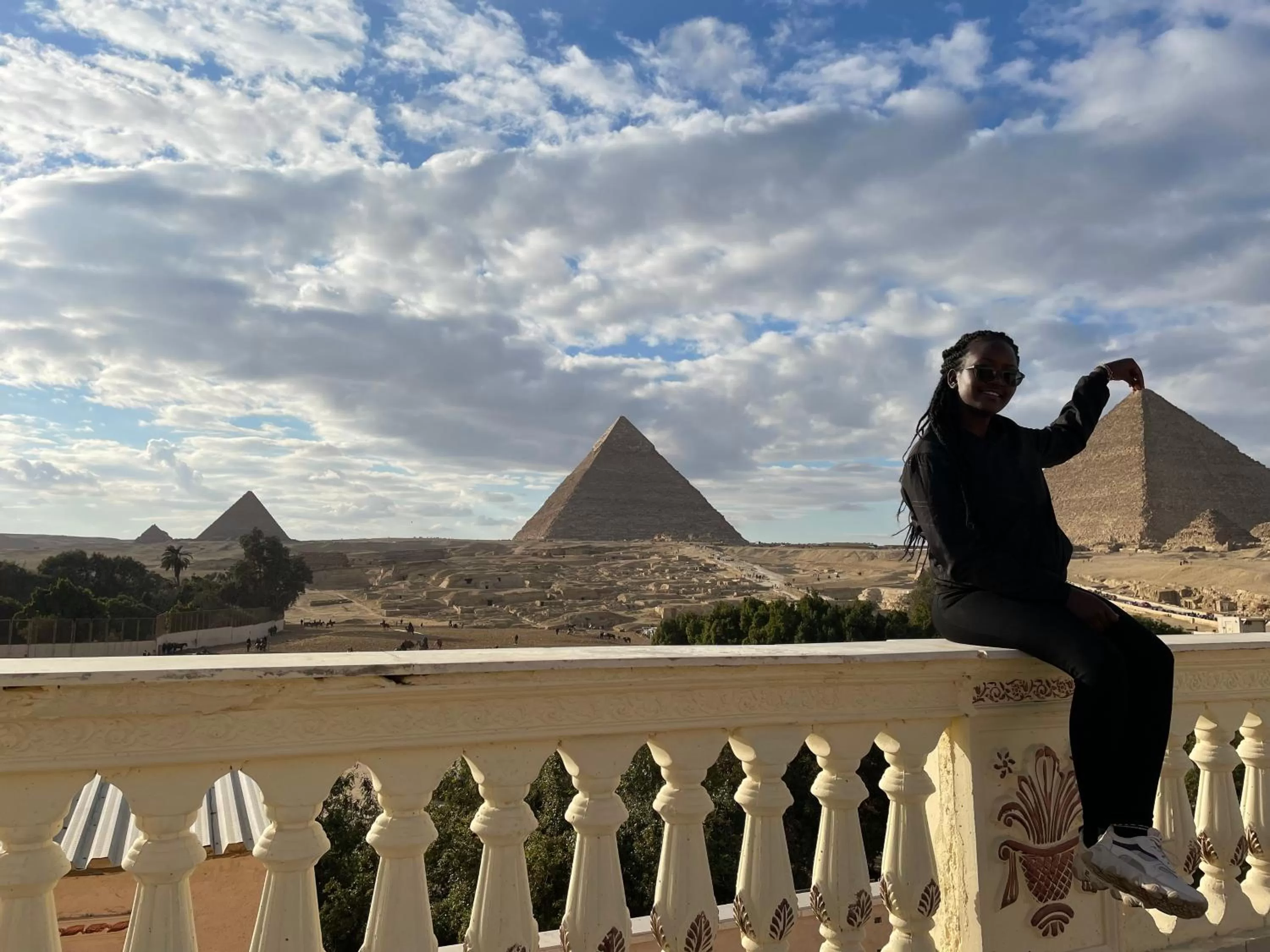 Sphinx palace pyramids view