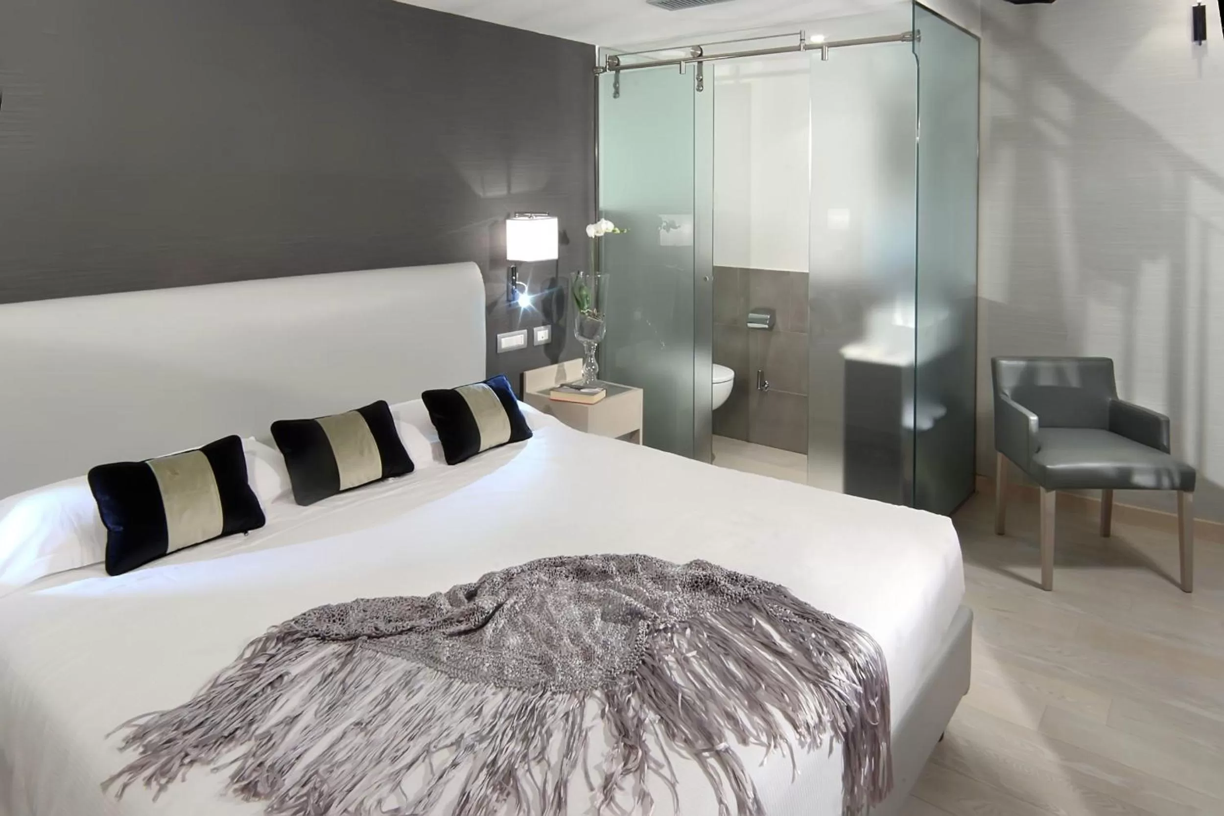 Bed in Hotel Adriano