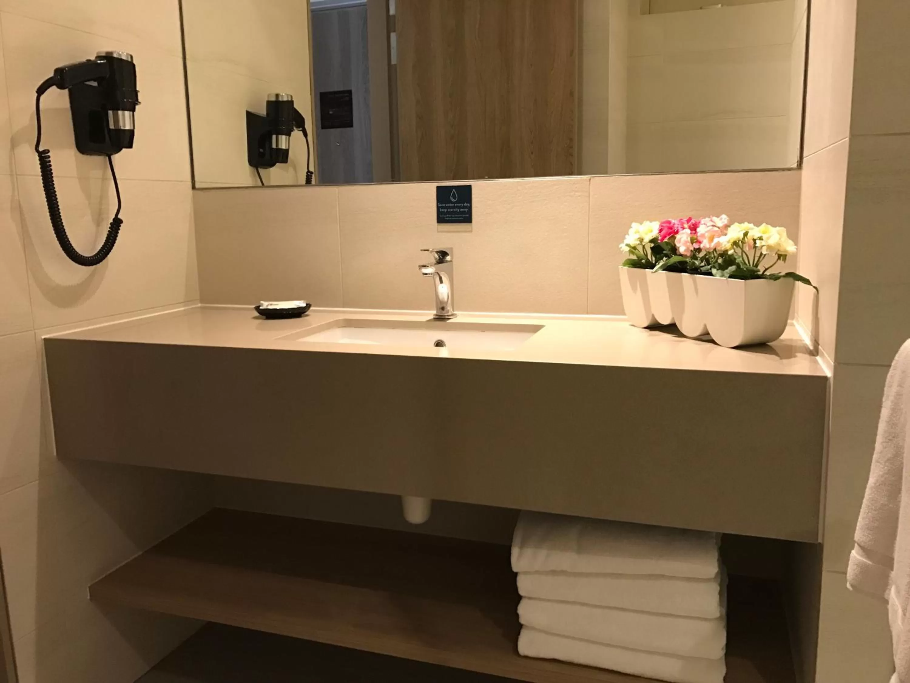 Bathroom in D'Resort @ Downtown East