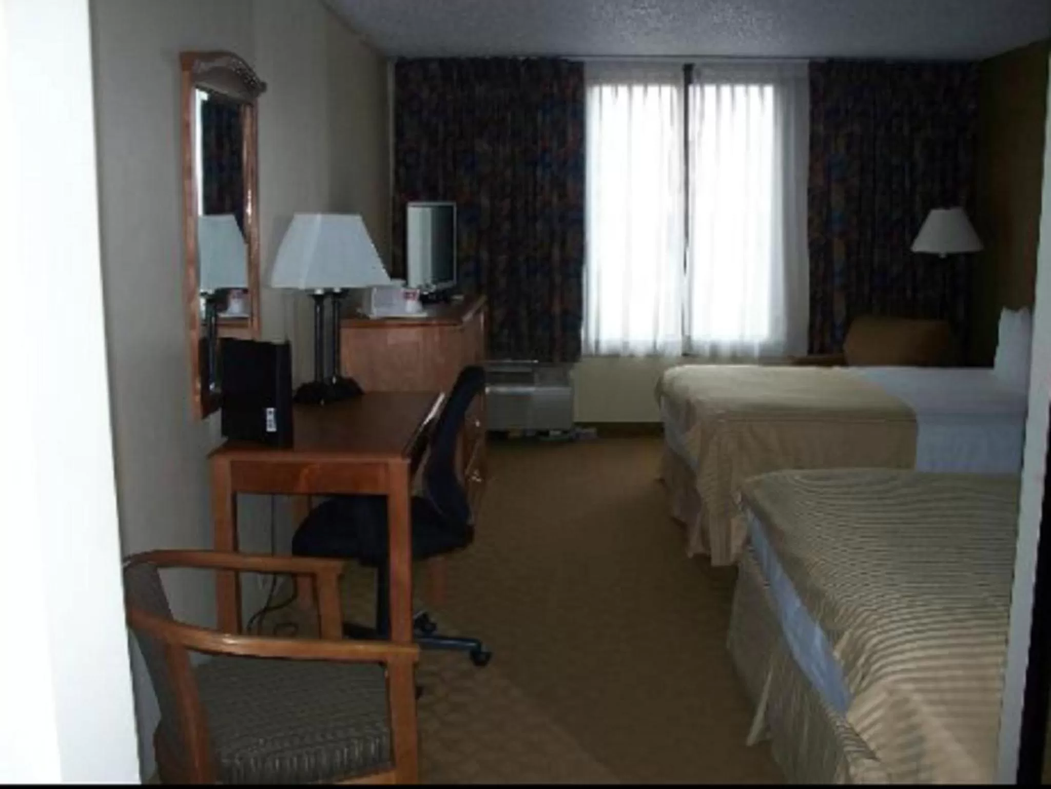 Day, Bed in Ramada by Wyndham Watertown Thousand