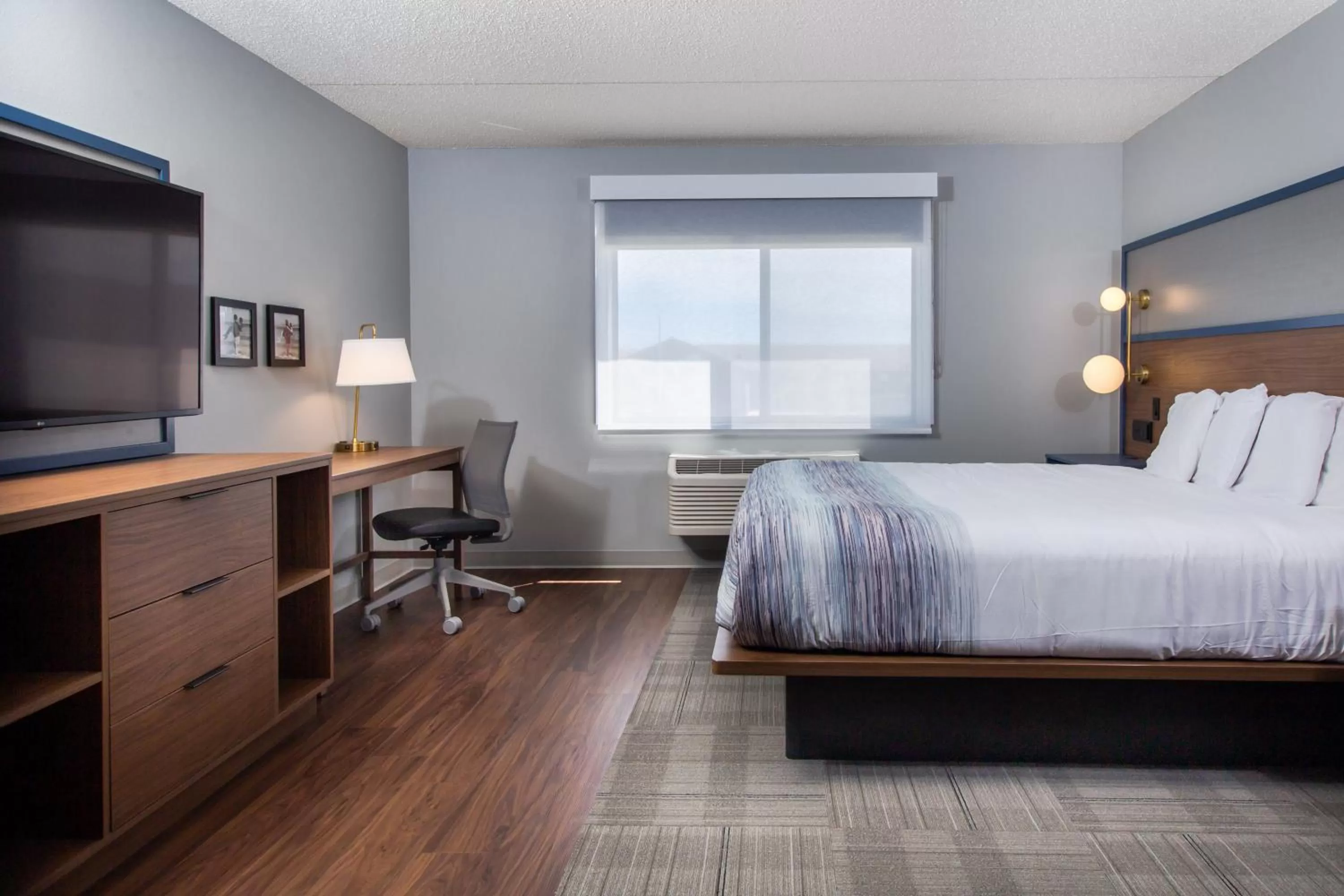 TV and multimedia, Bed in AmericInn by Wyndham Rapid City