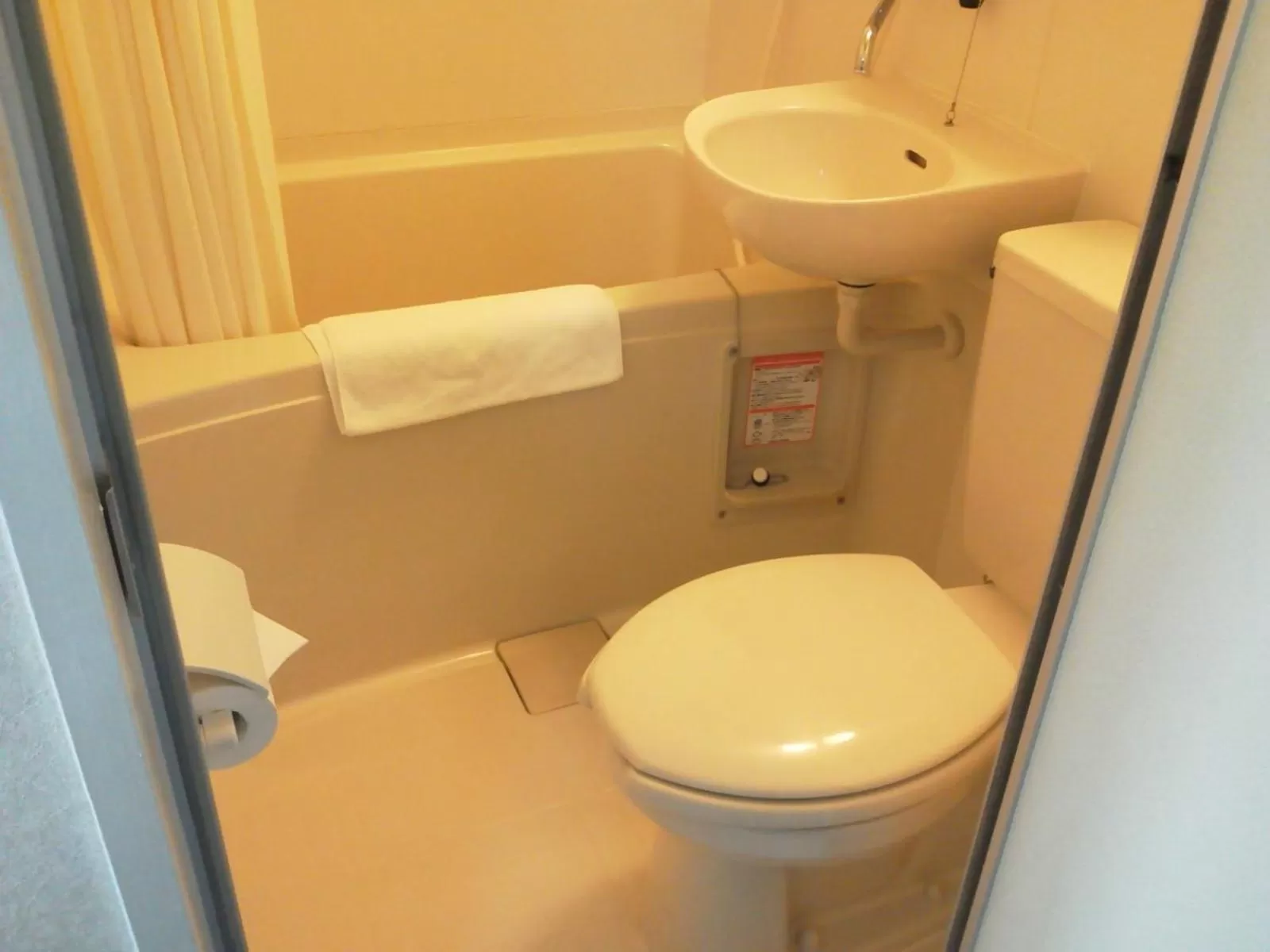 Toilet in Resort Inn North Country