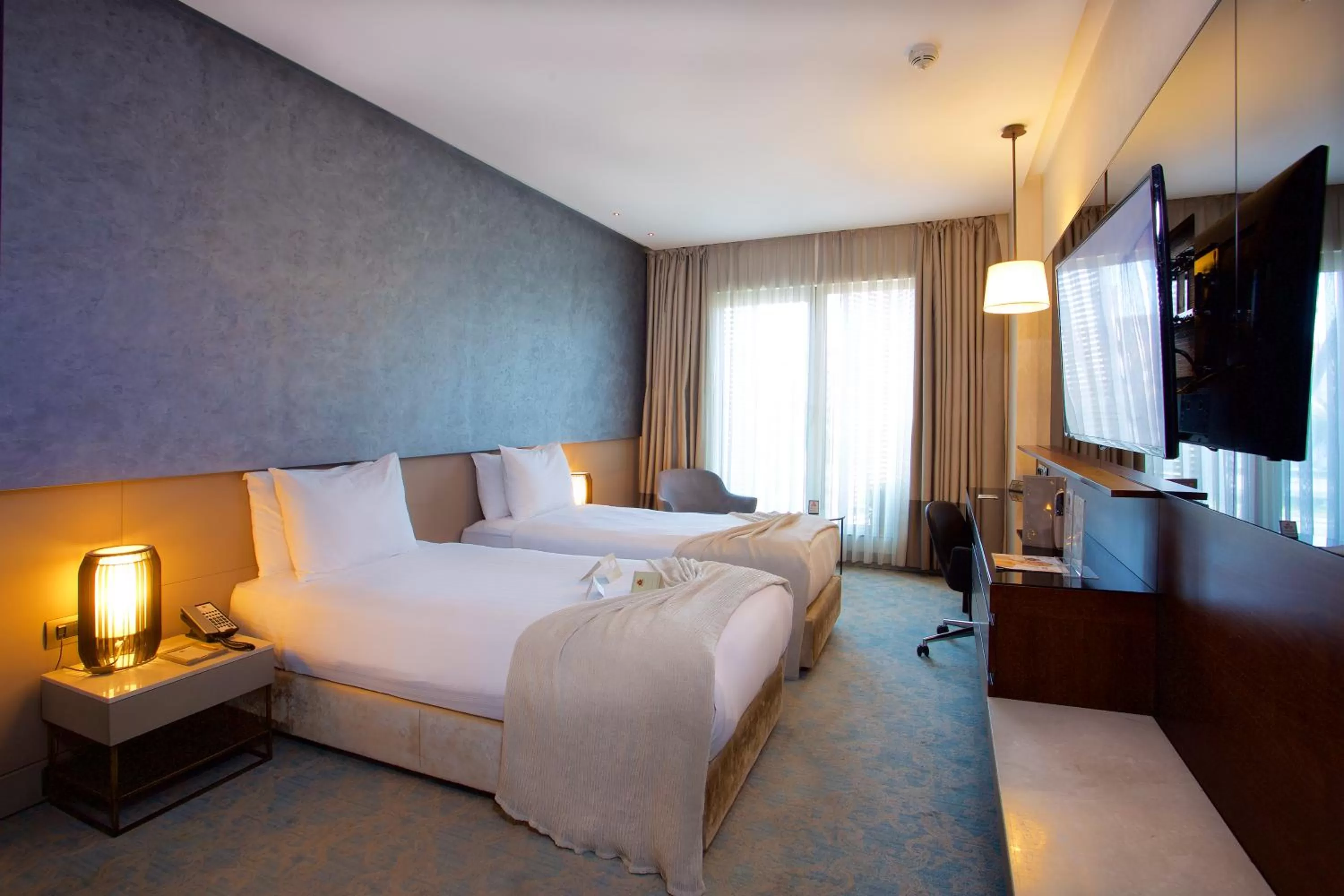 Bed in Dosso Dossi Hotels & SPA Downtown