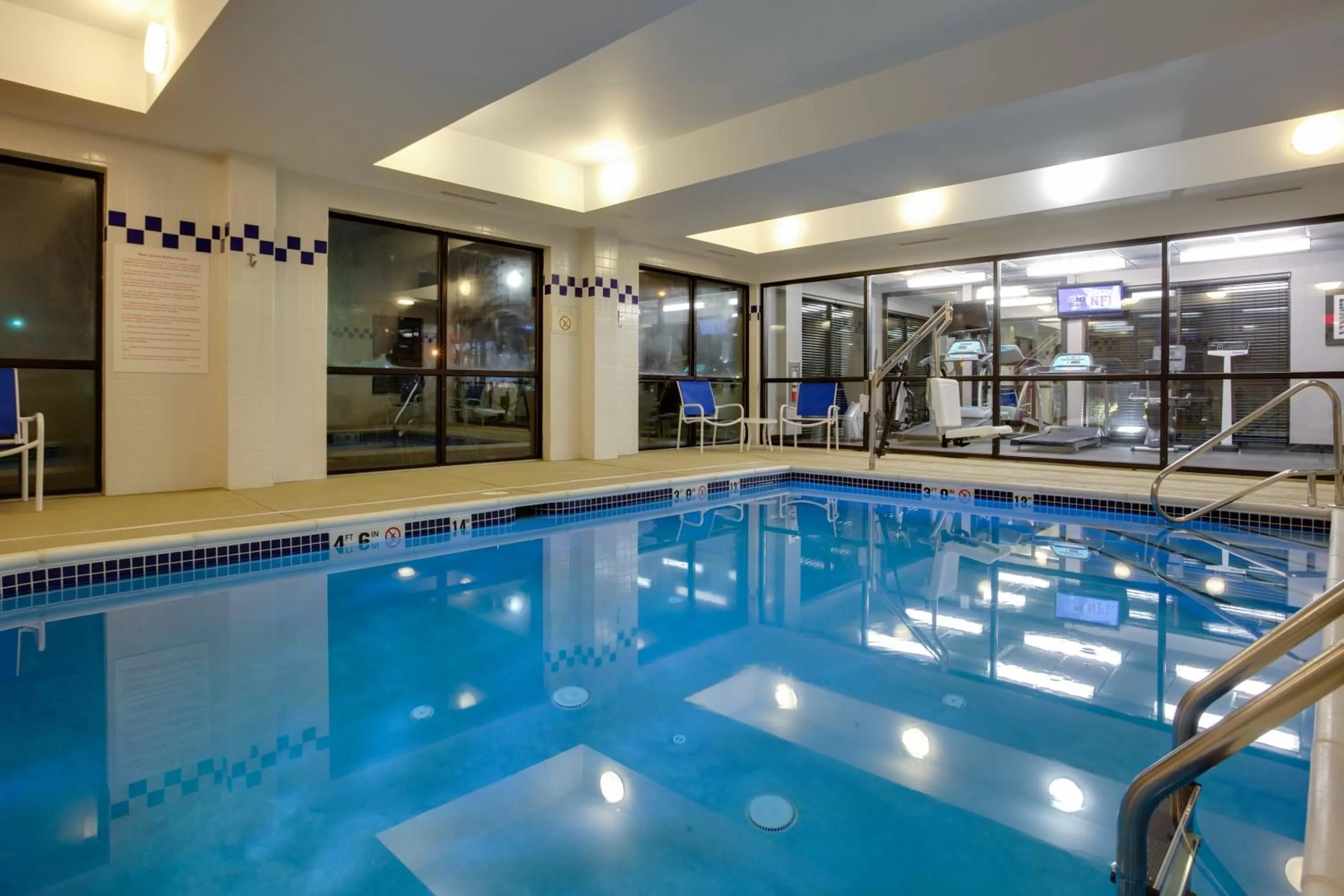 Swimming pool in Holiday Inn Express Hotel & Suites Meadowlands Area by IHG