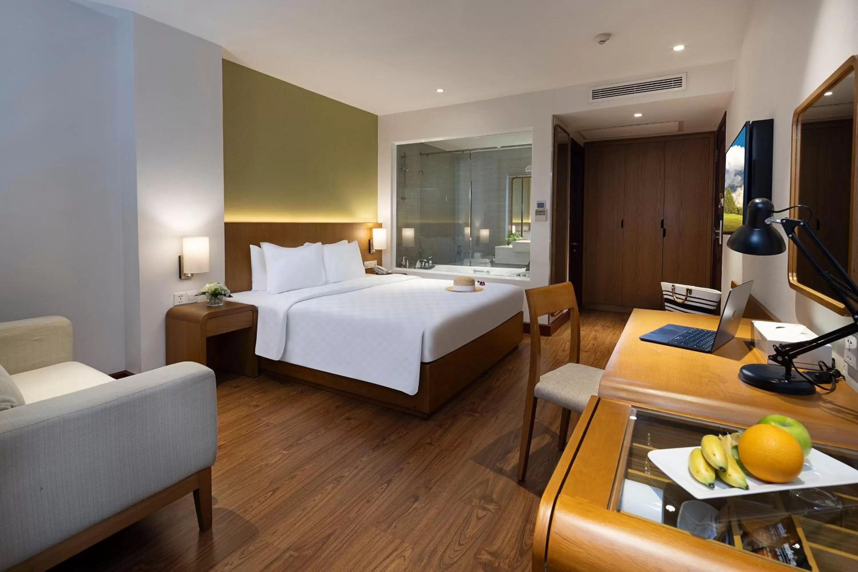 Seating area, Bed in Harmony Saigon Hotel & Spa