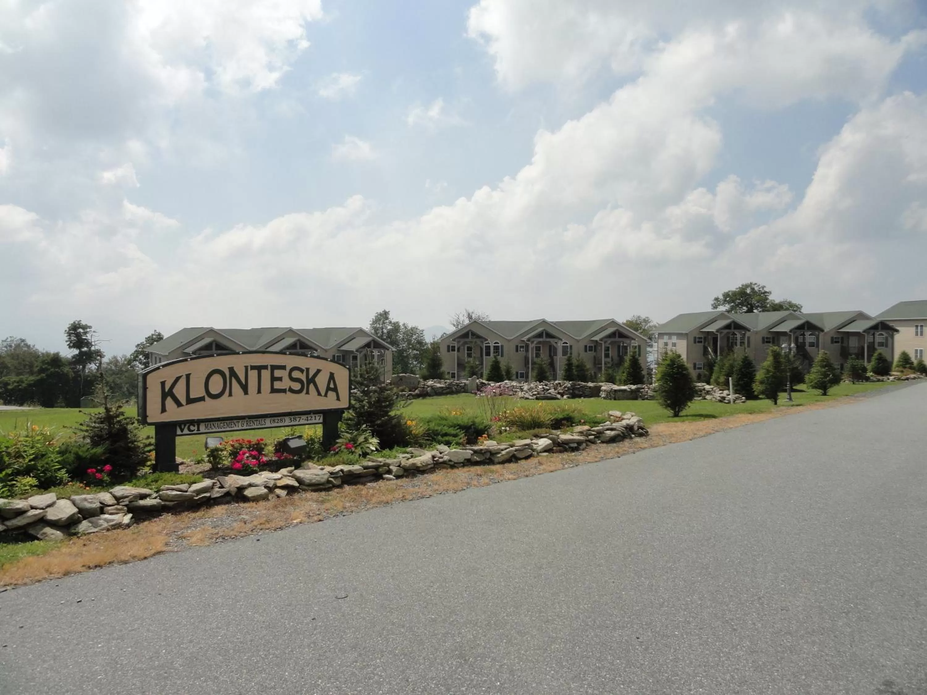 Property logo or sign in Klonteska Condominiums By VCI Real Estate Services