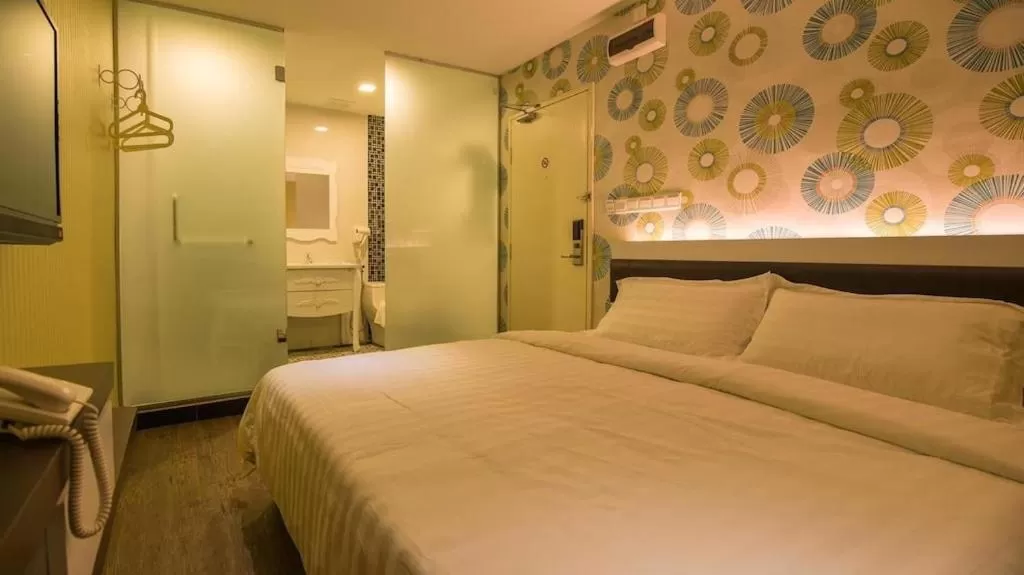 Bed in Riverfront Boutique Hotel