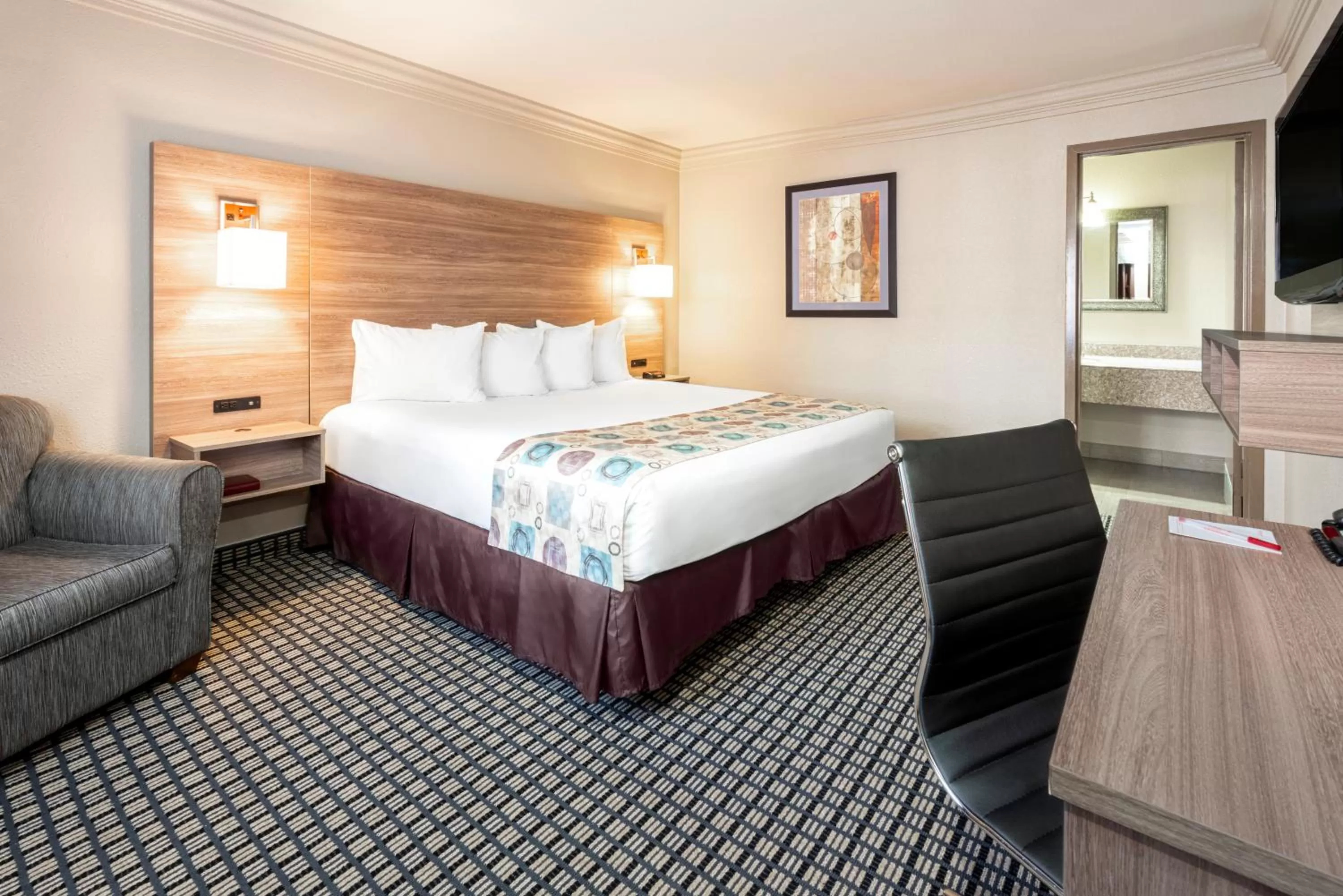 Photo of the whole room, Bed in Ramada by Wyndham Houston Intercontinental Airport South