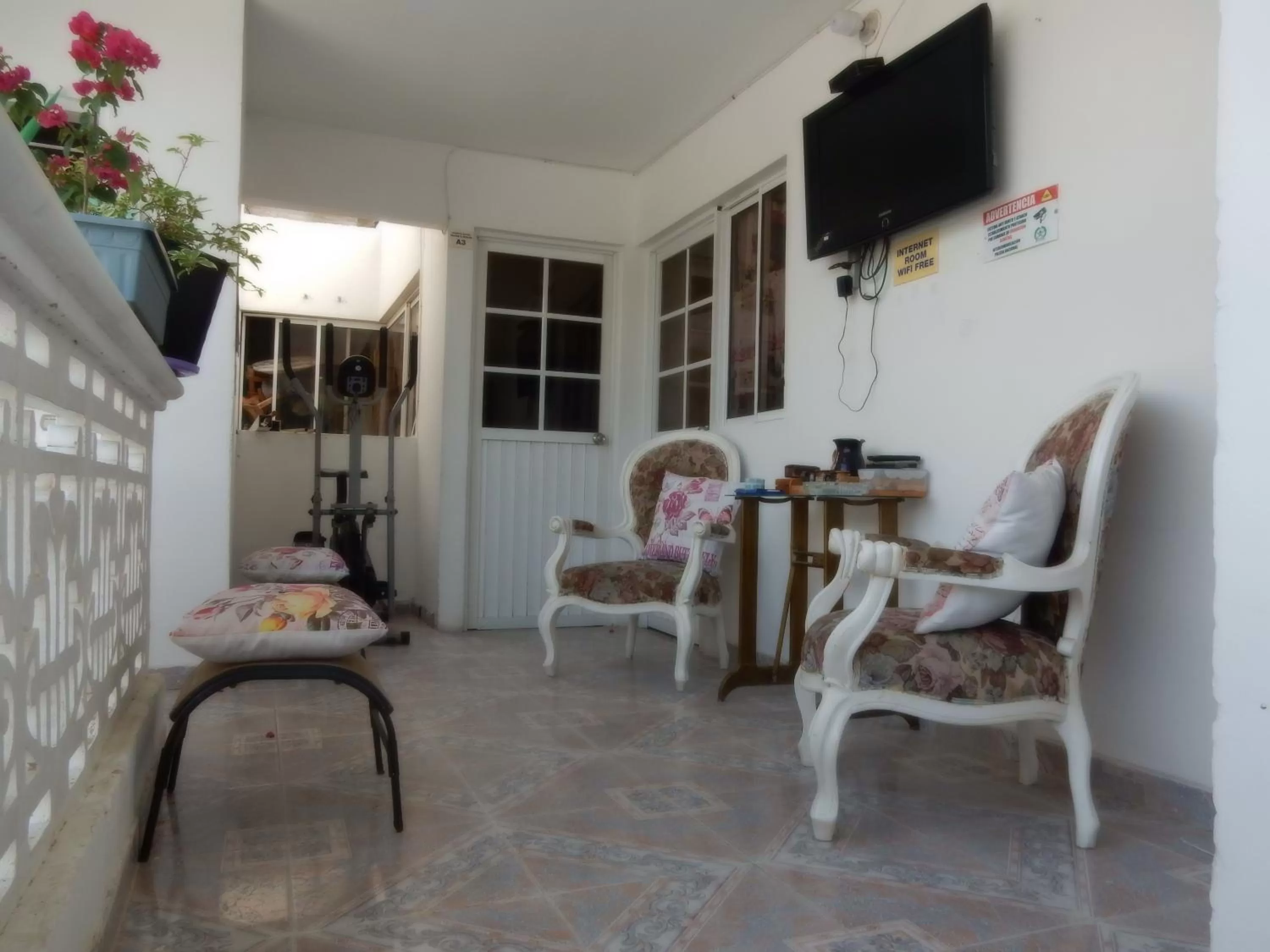 Communal lounge/ TV room, Seating Area in Maria's House - Boutique Hotel