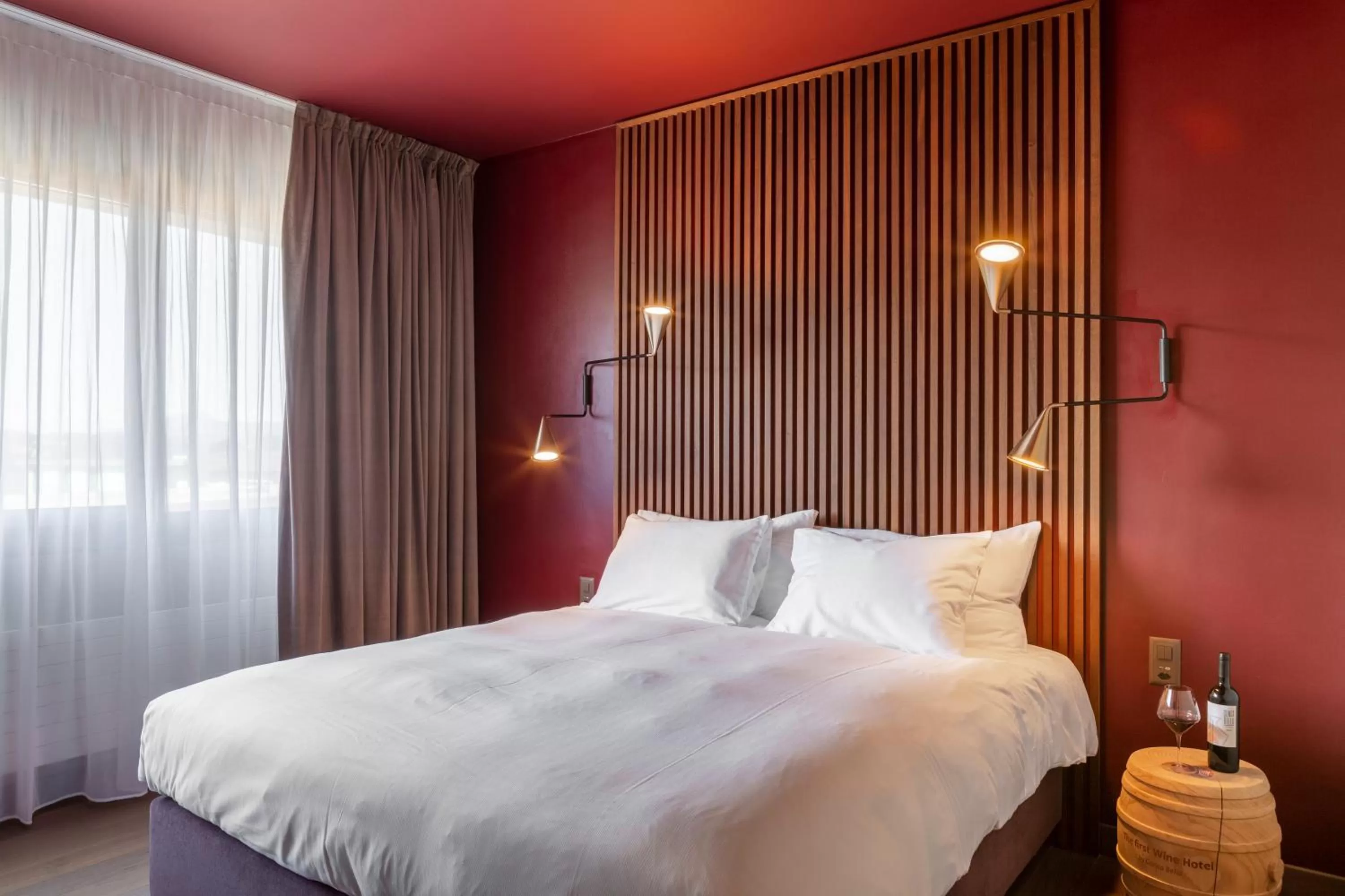 Bed in Conca Bella Boutique Hotel & Wine Experience