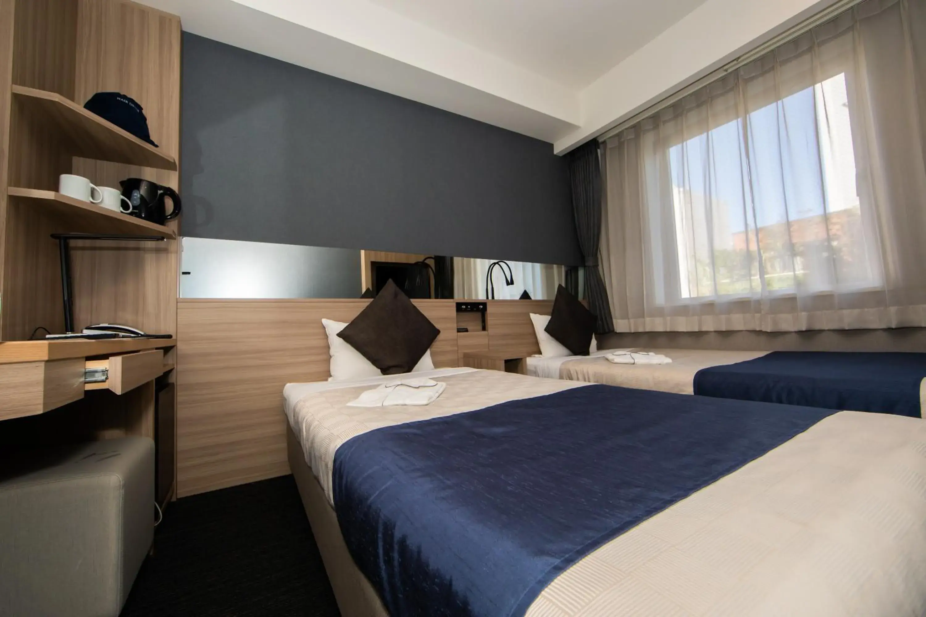 Standard Twin Room - Smoking in Quintessa Hotel Osaka Shinsaibashi Comic & Books Standard Twin Room - Smoking in Quintessa Hotel Osaka Shinsaibashi Comic & Books