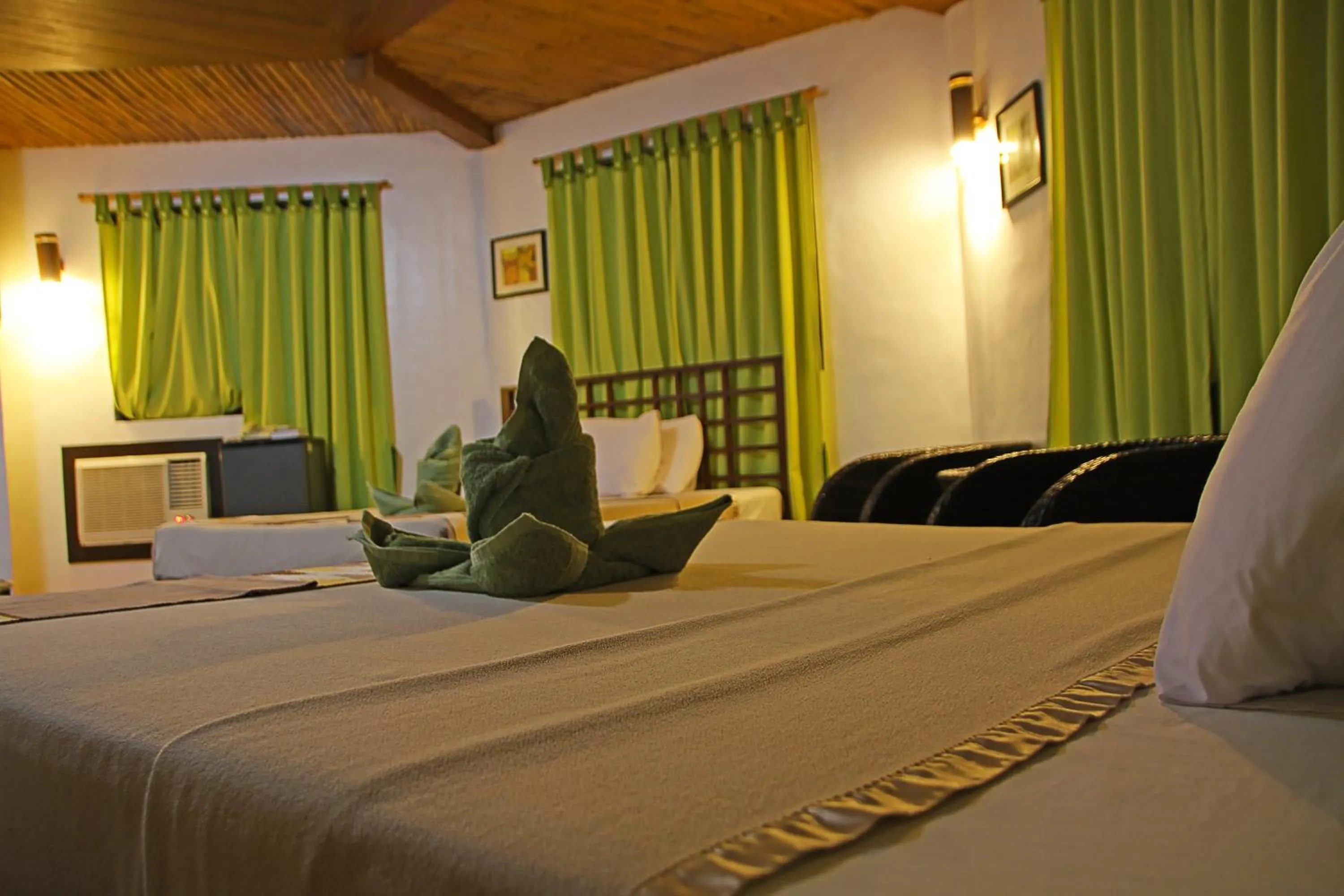 Living room, Bed in Coron Hilltop View Resort