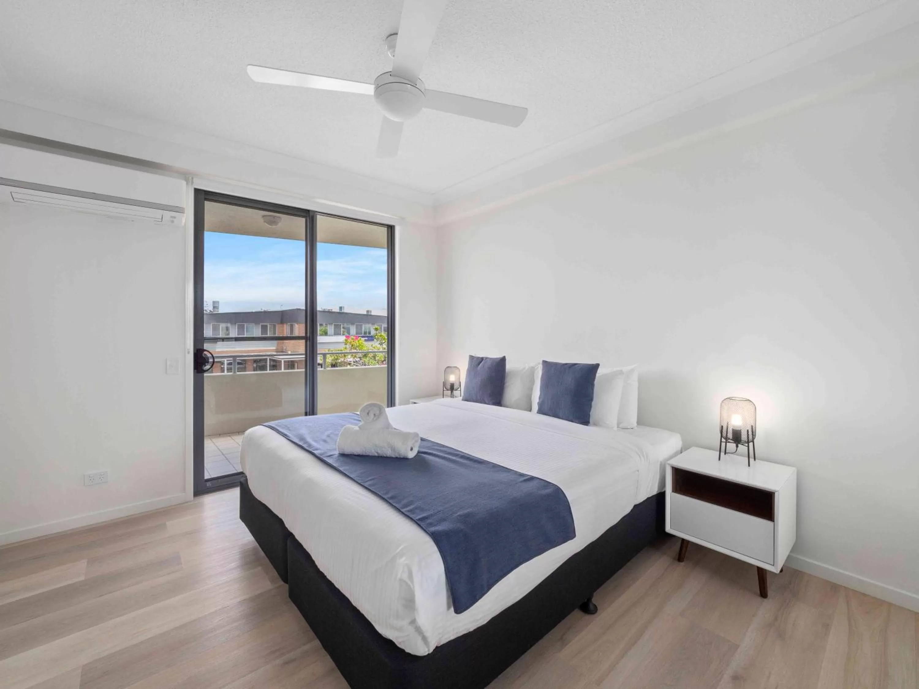 Bed in Pacific Marina Apartments