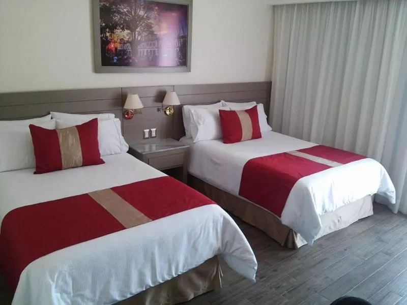Bed in Hotel Mansur Business & Leisure