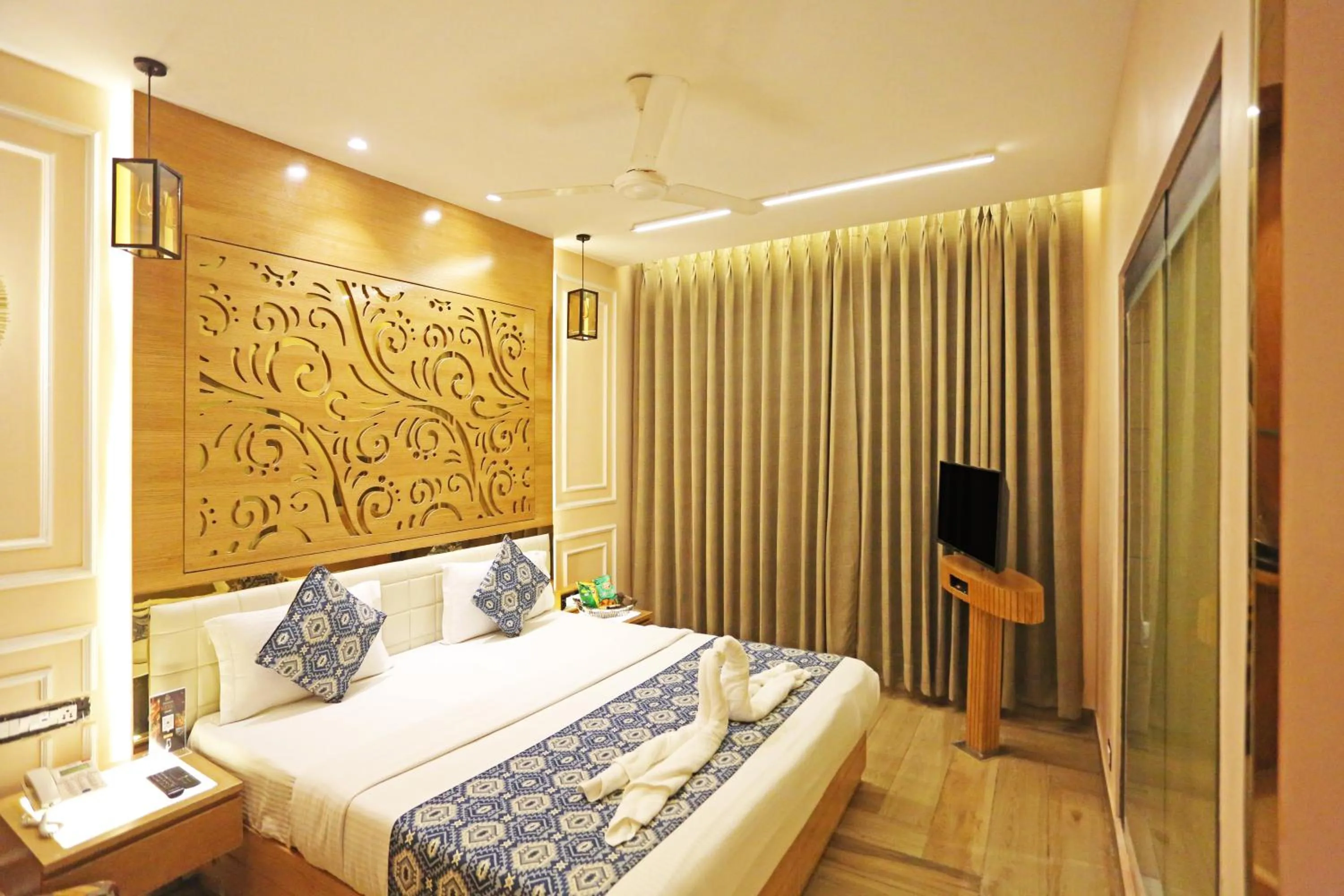 Bed in JRD Luxury-Business Hotel