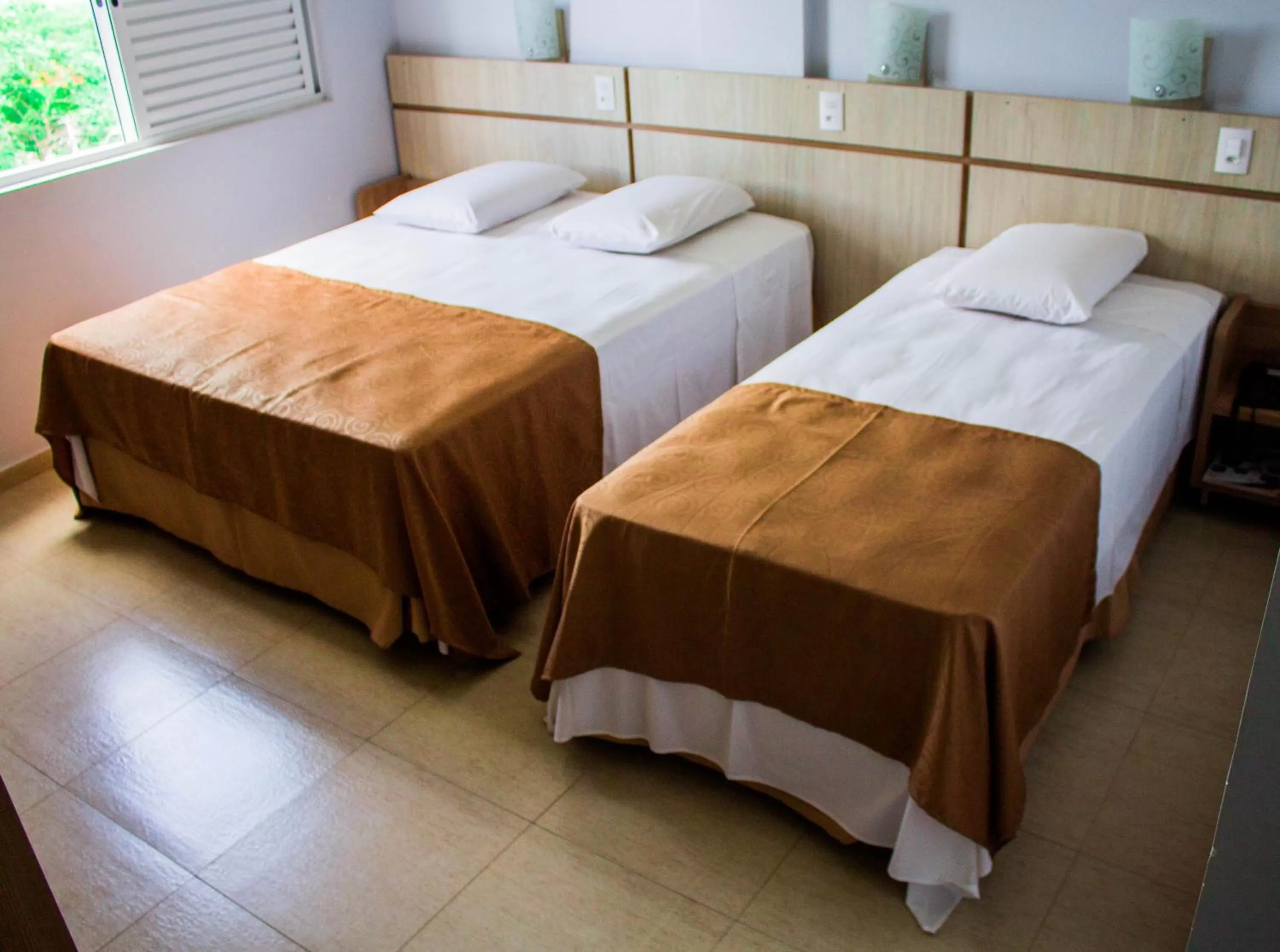 Bed in Hotel Baviera Iguassu