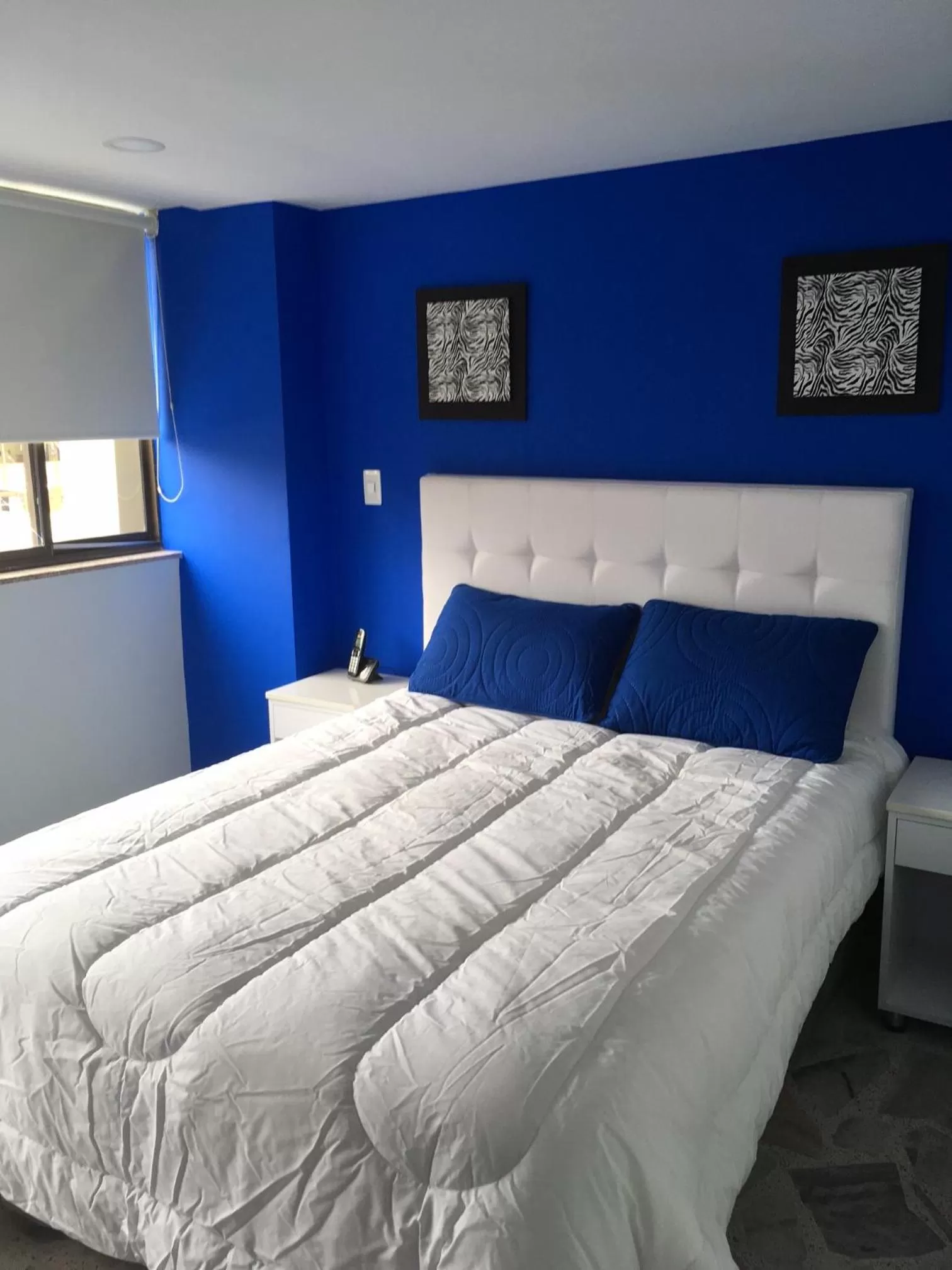 Bed in Hotel Garden City Boutique