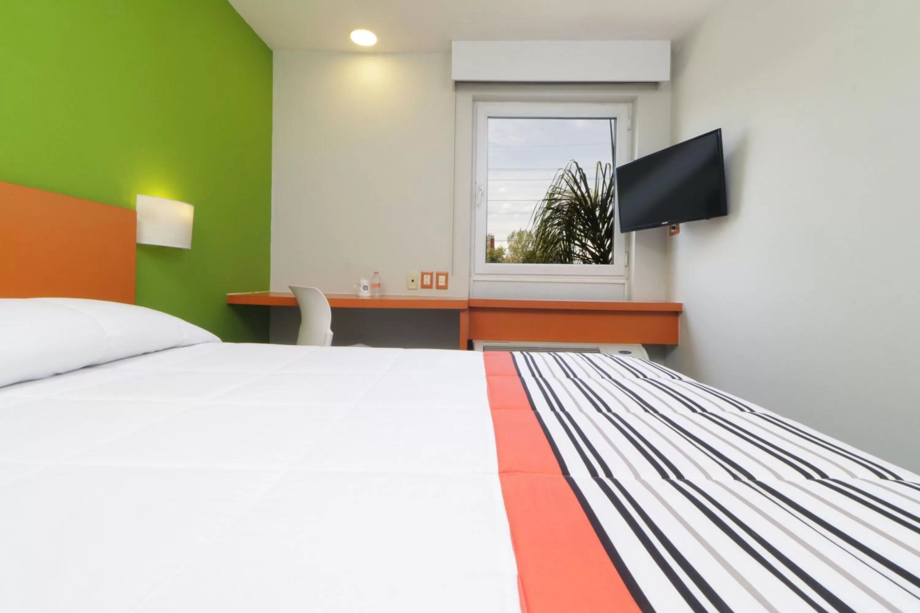 Bedroom, Bed in City Express Junior by Marriott Toluca Aeropuerto
