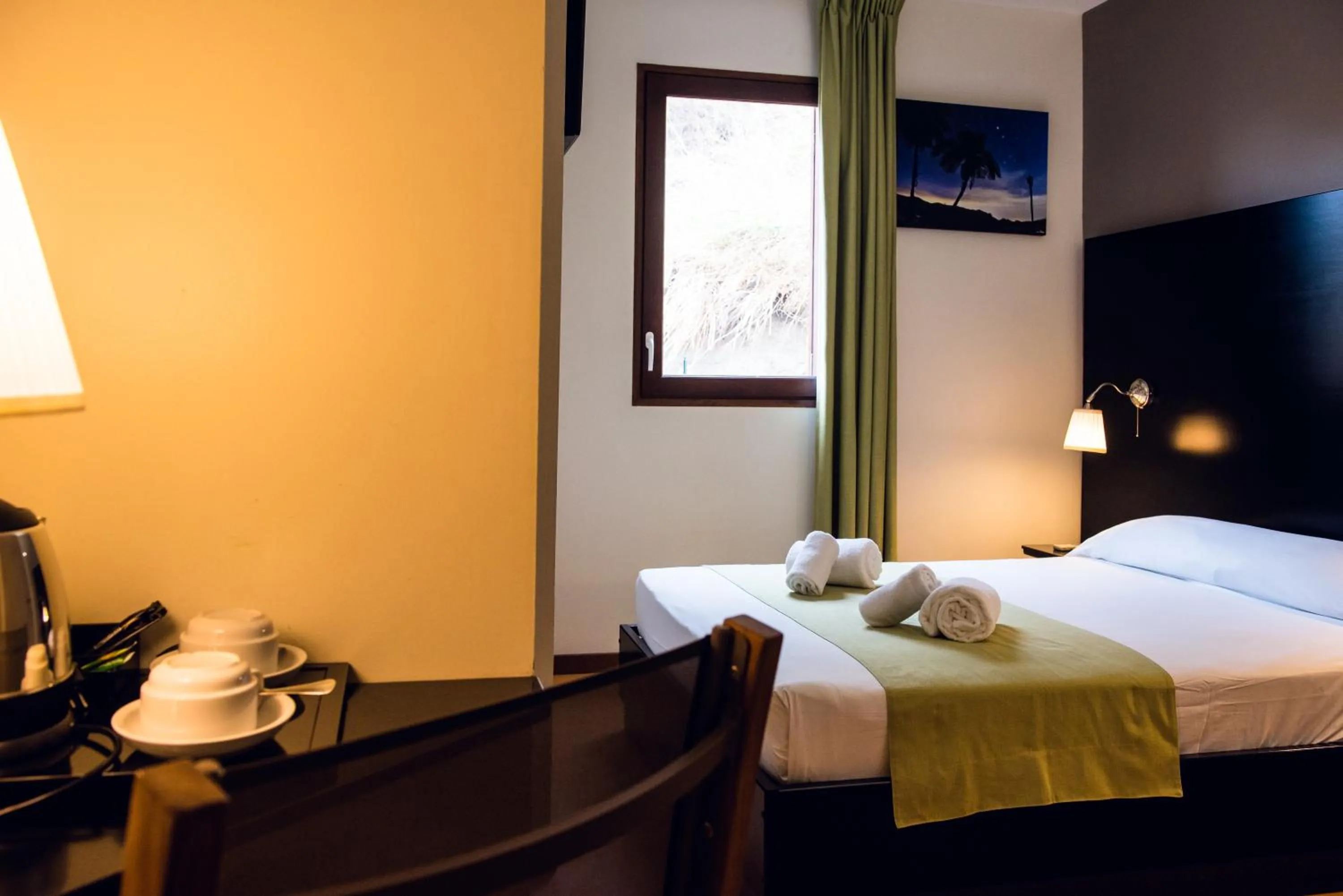 Photo of the whole room, Bed in Tama Hotel