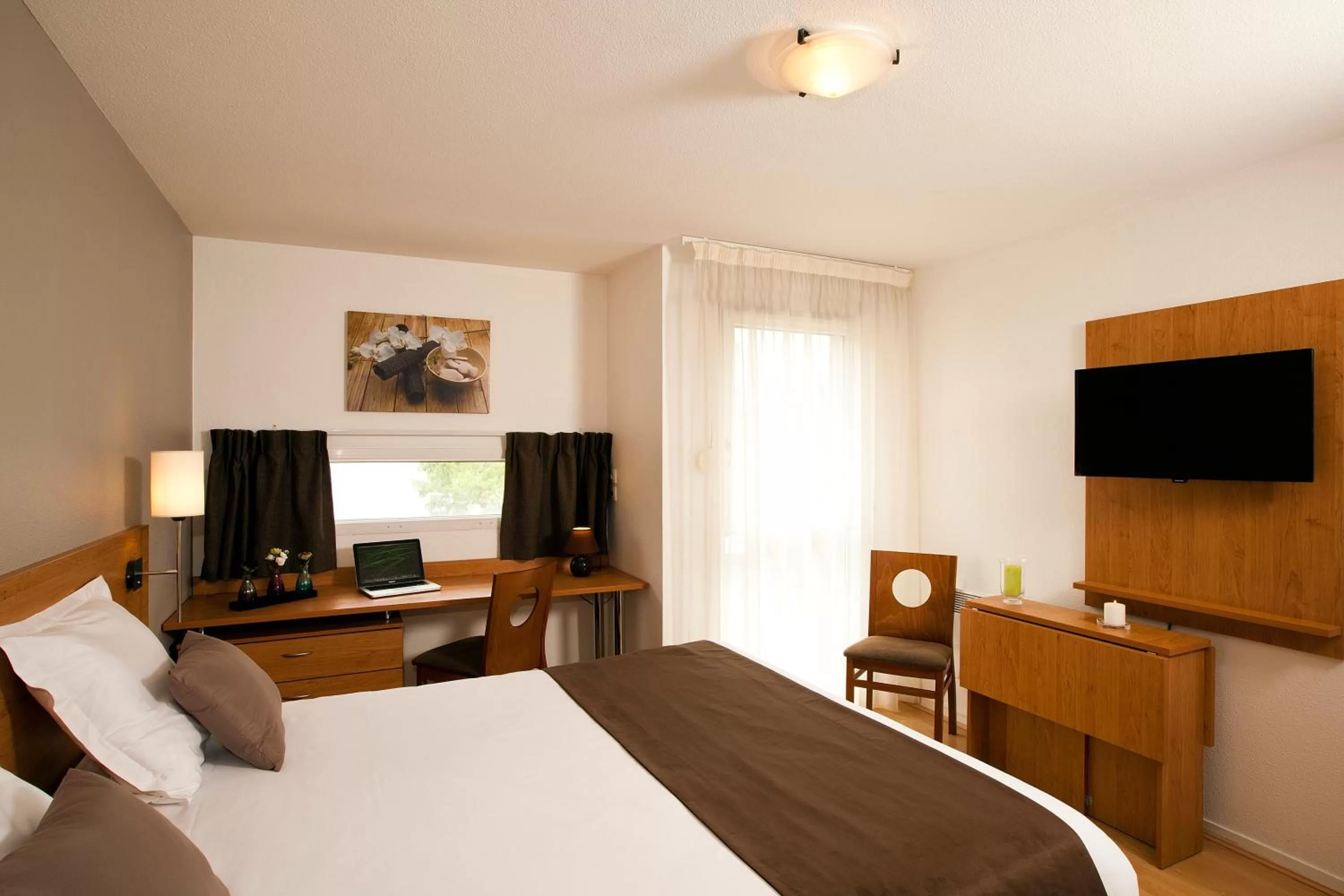 Photo of the whole room, Bed in Séjours & Affaires La Rochelle Les Minimes