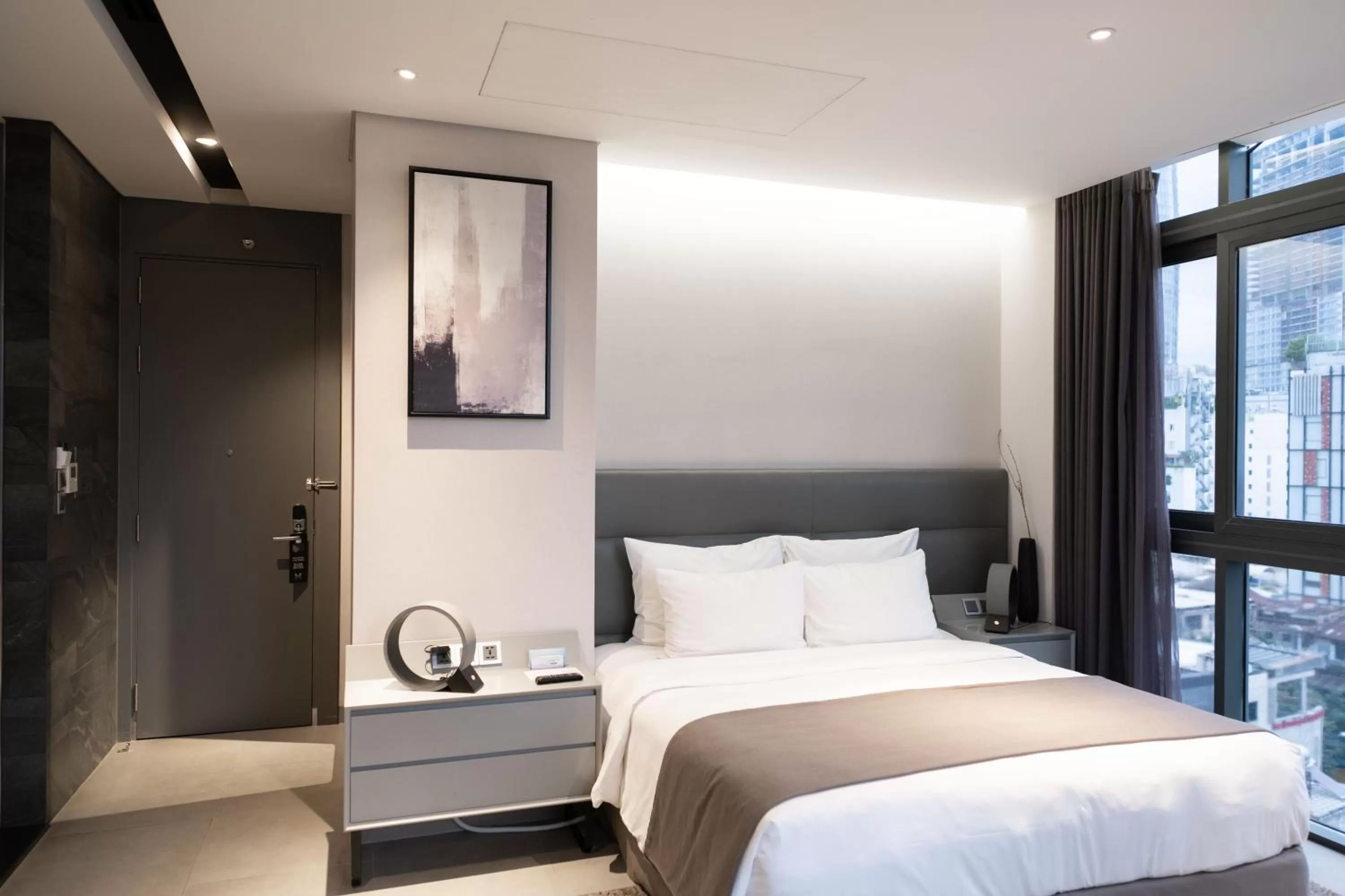 Bed in M Hotel Saigon