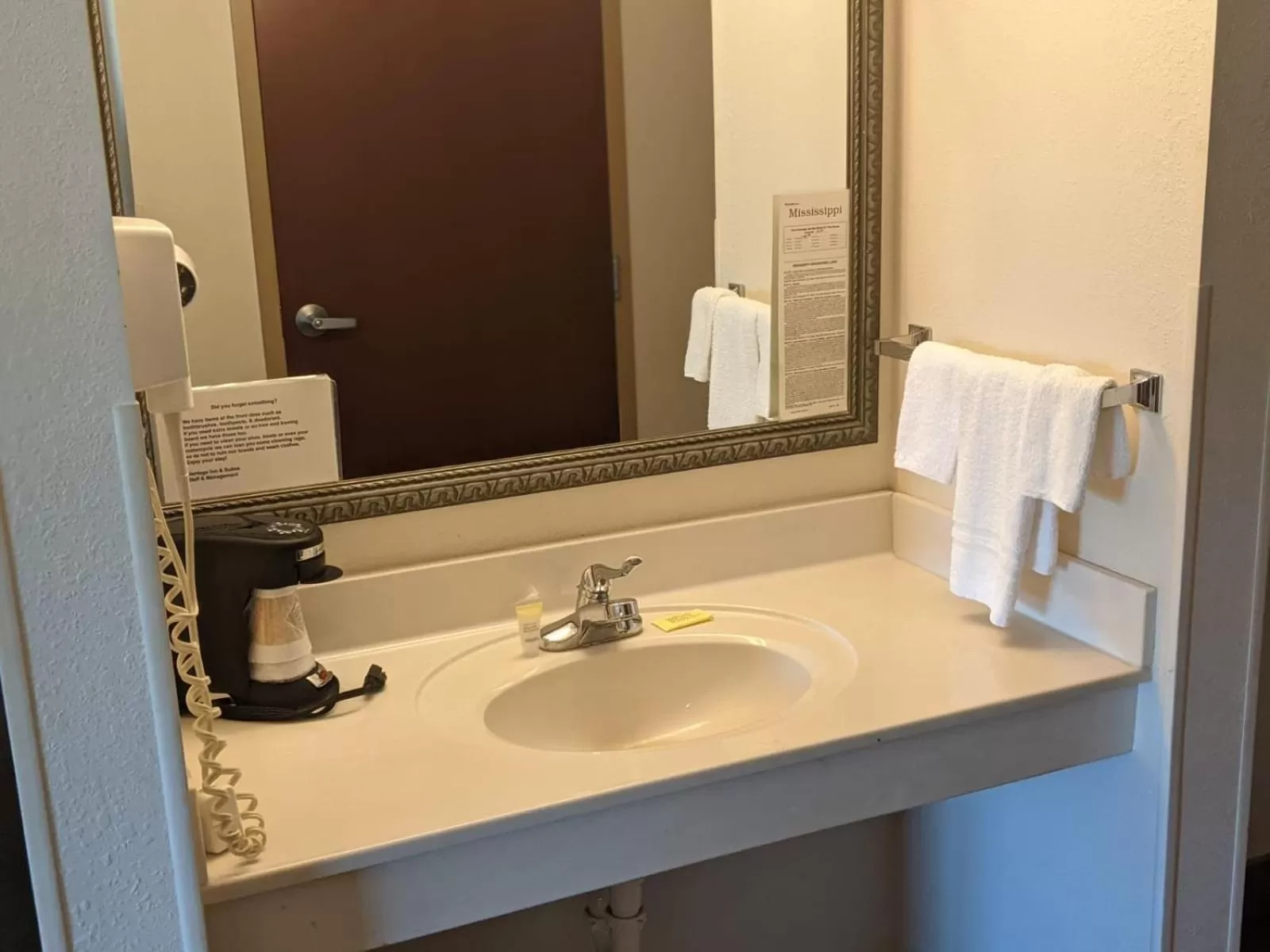 Bathroom in Heritage Inn and Suites