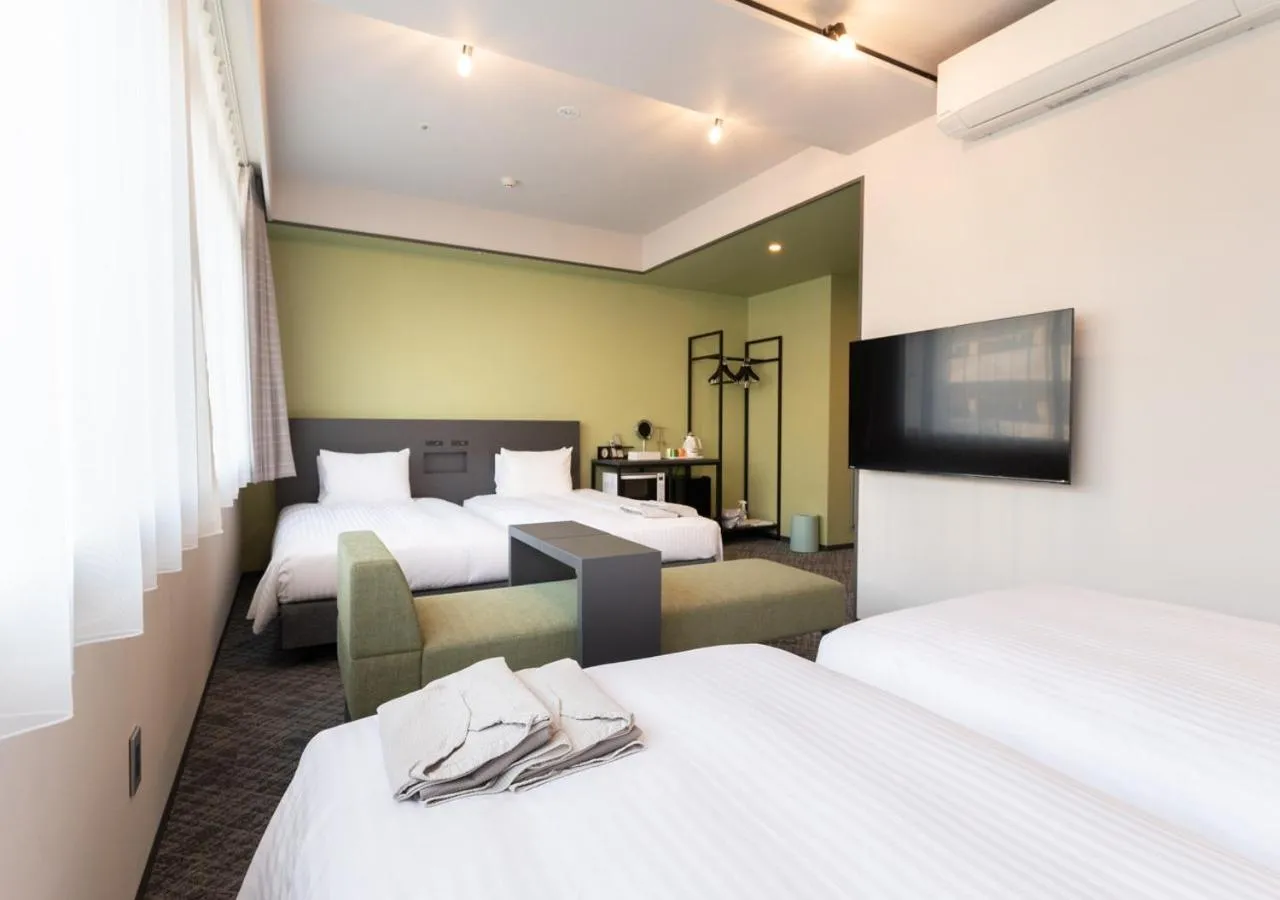 Photo of the whole room, Bed in Hotel Cocktail Stay Naha