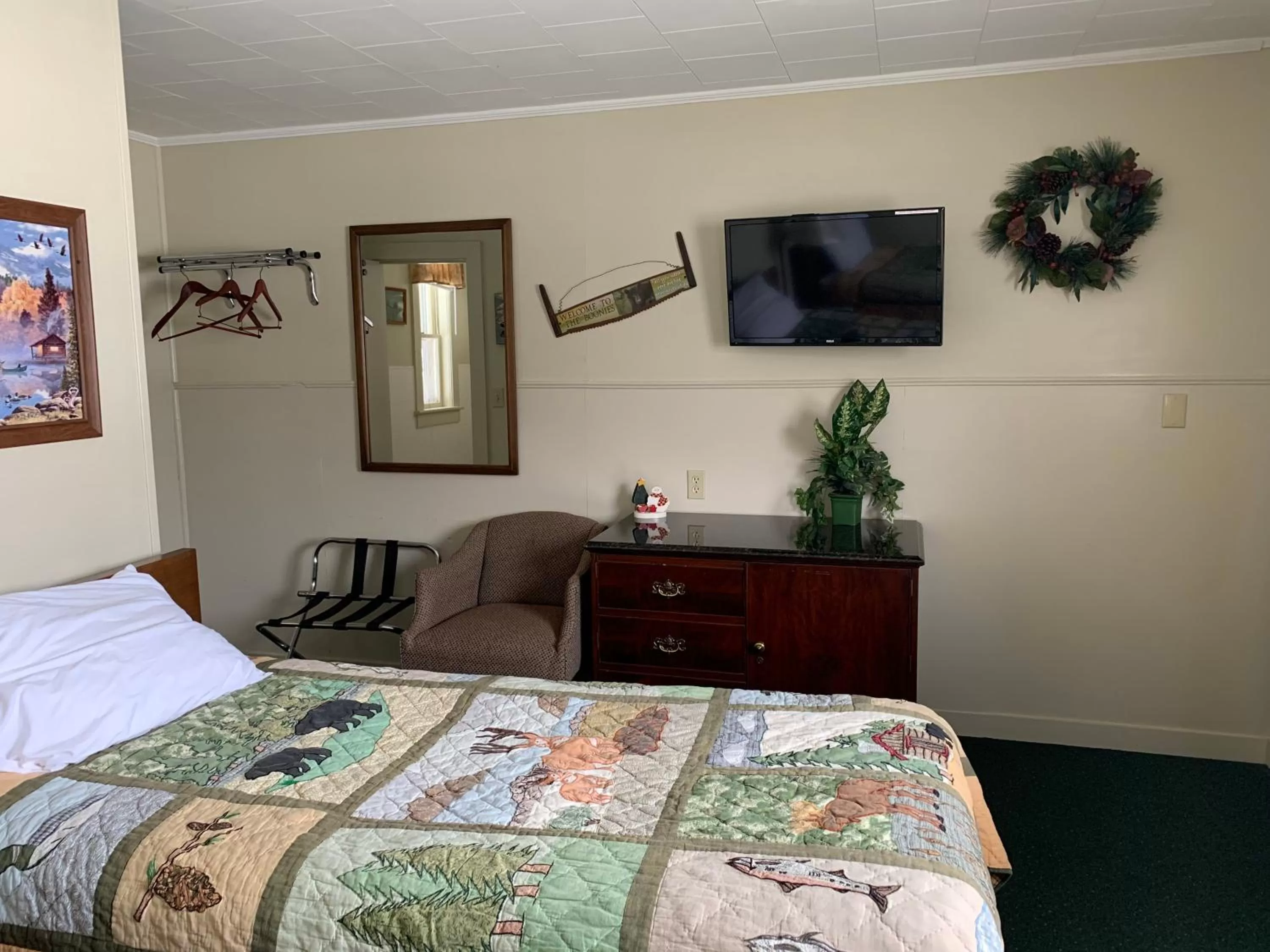 Bed in carrollmotel and cottages