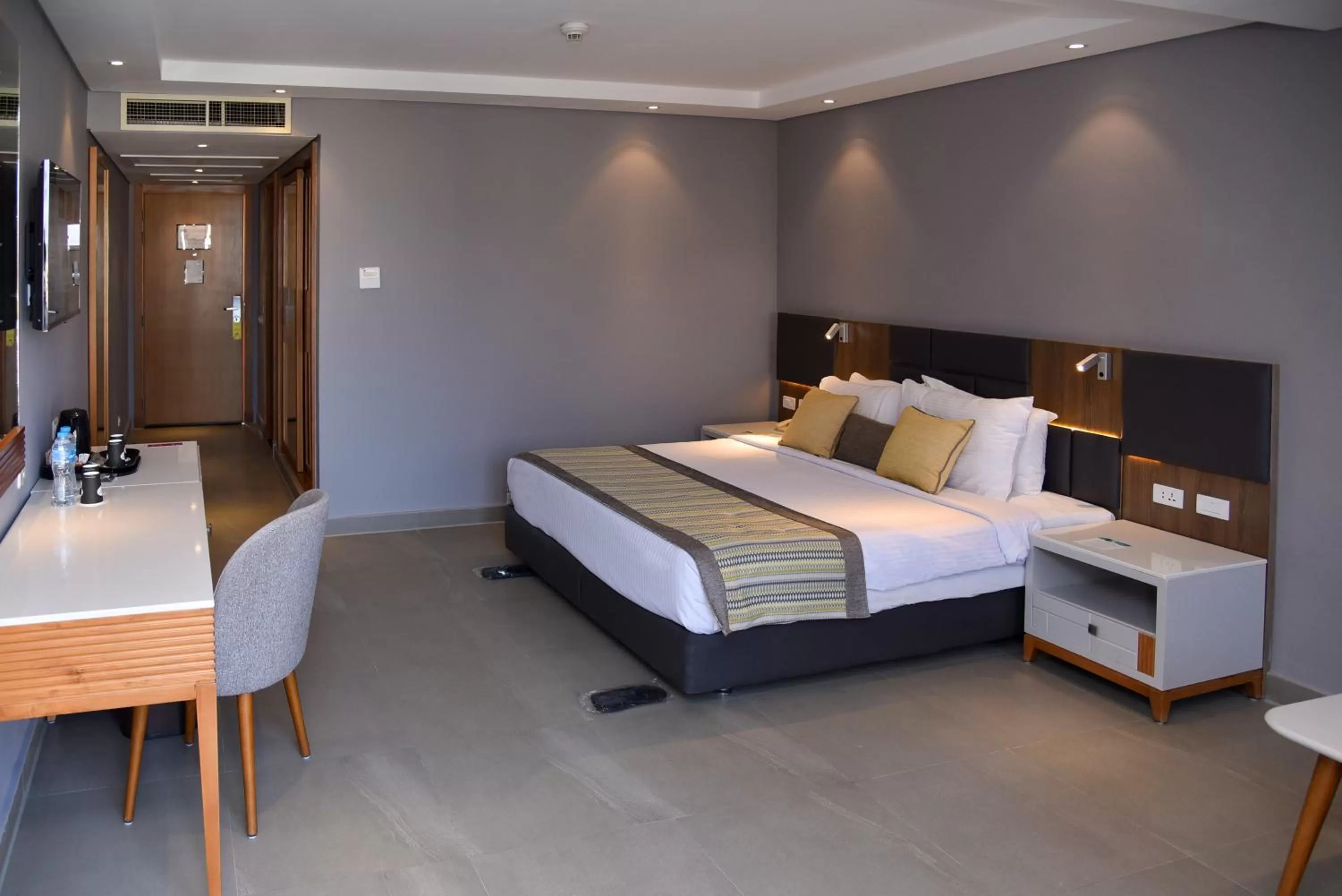 Bedroom, Bed in Sunrise Diamond Beach Resort -Grand Select