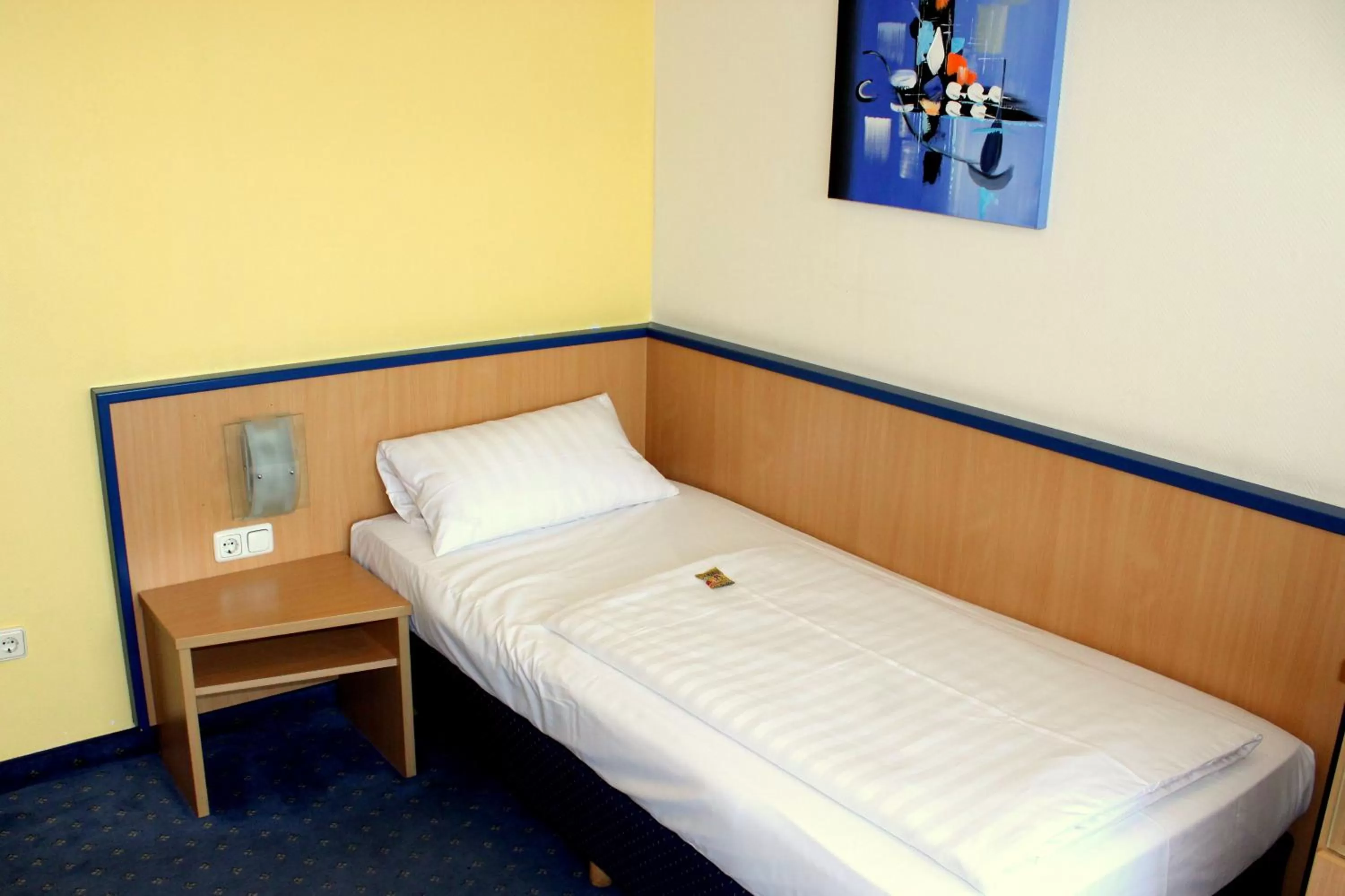 Bed in NP Hotel Wallis