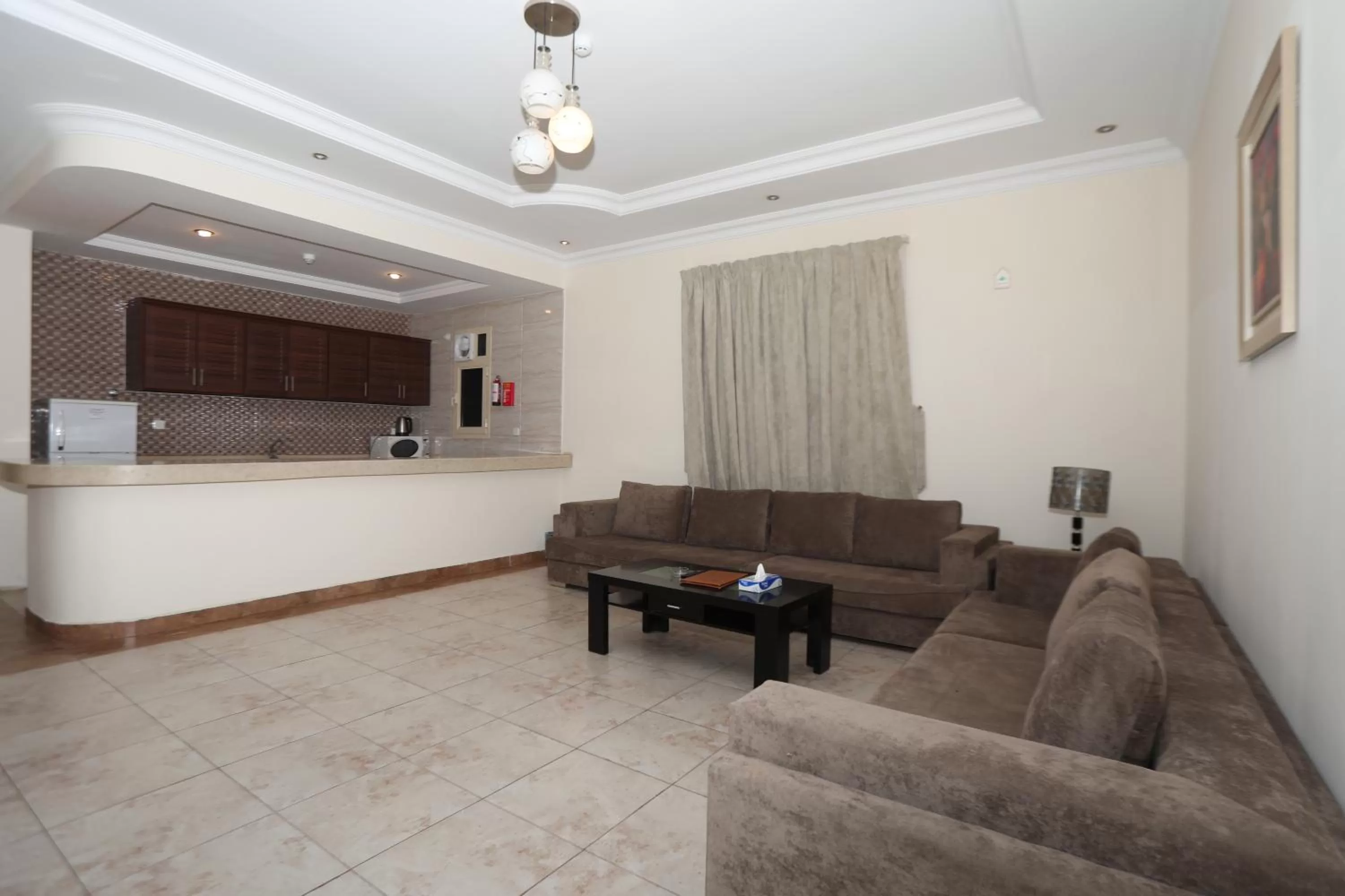 Kitchen or kitchenette, Seating Area in Samaya Suites