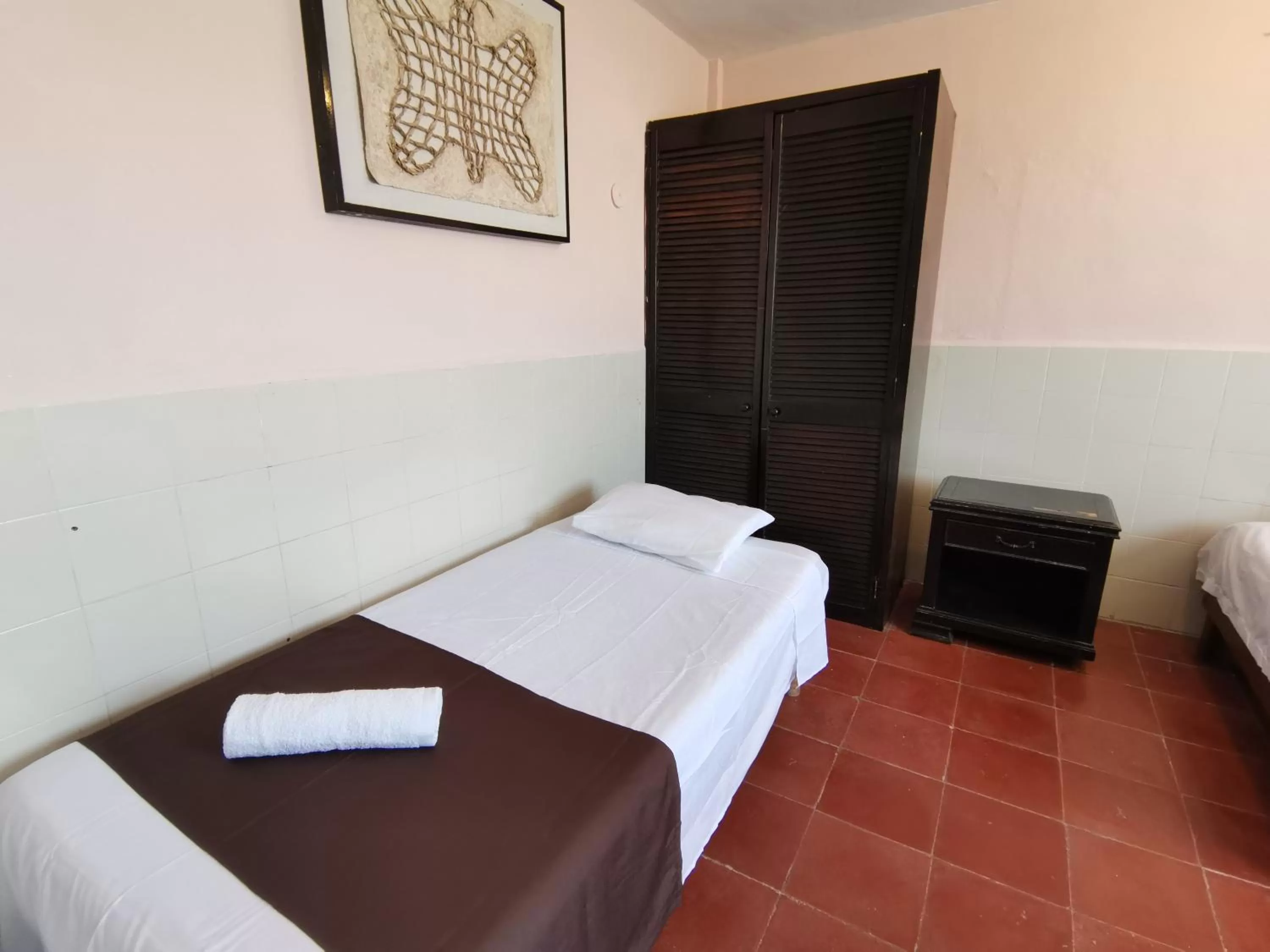 Bed in Hotel Colonial San Carlos