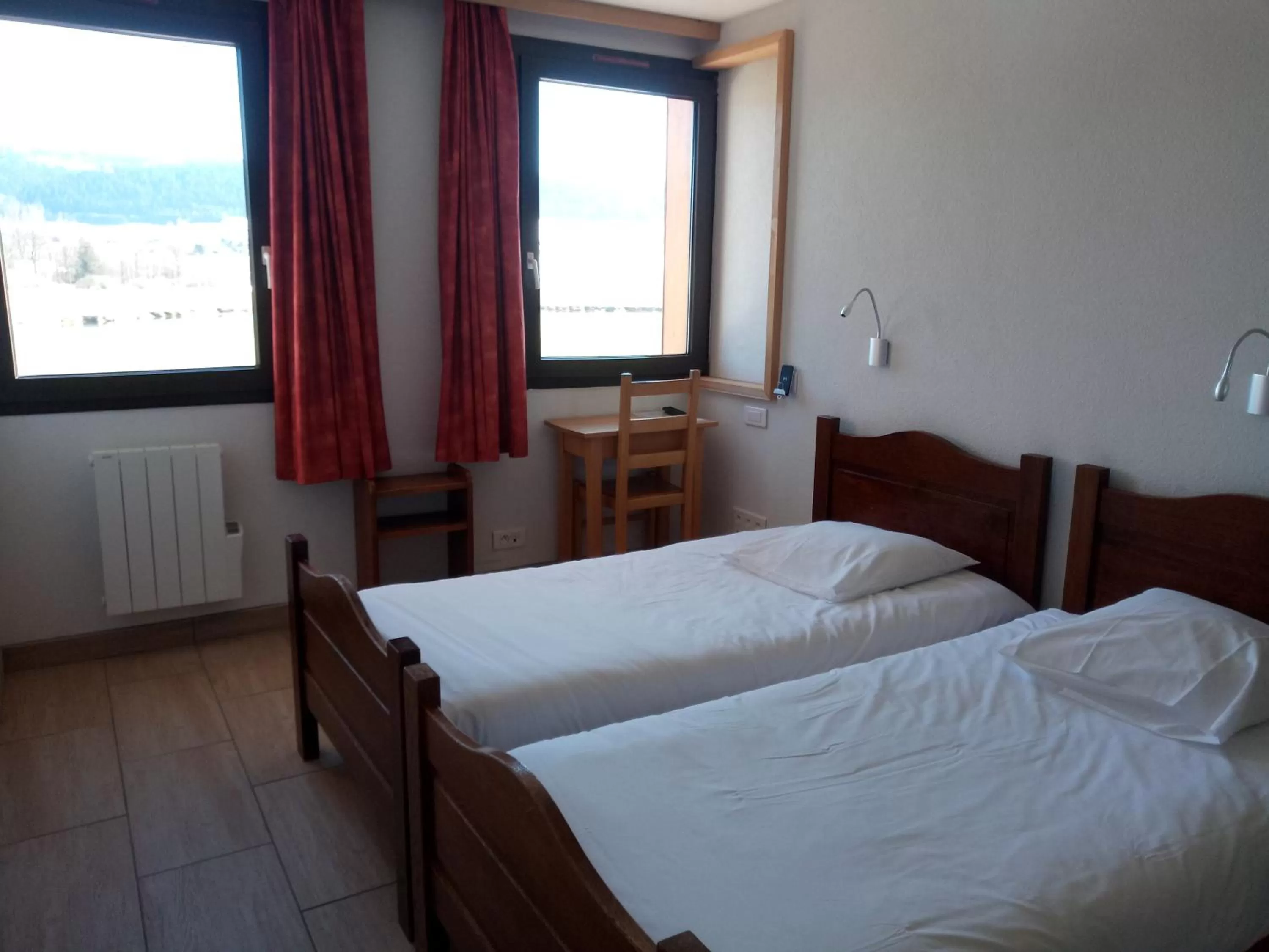 Photo of the whole room, Bed in Espace Morteau