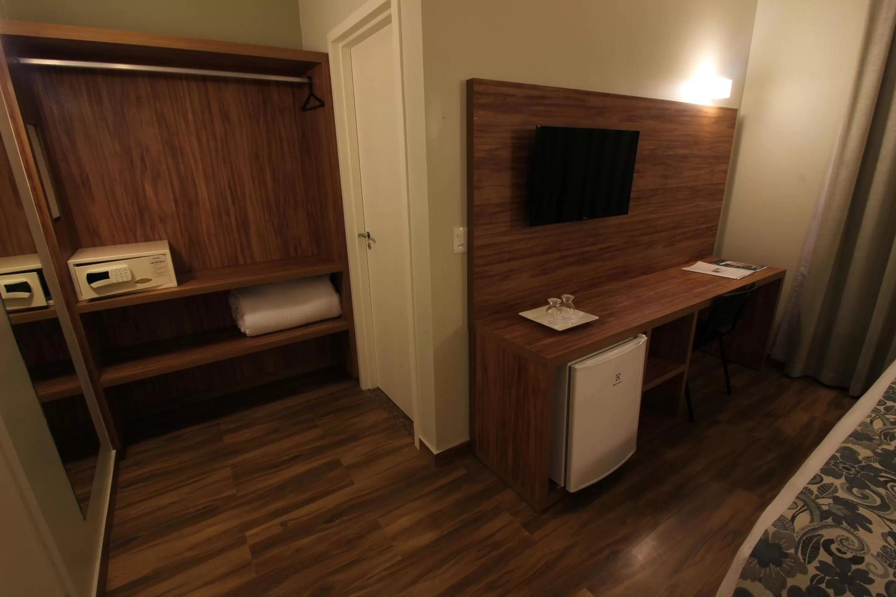 Photo of the whole room in Impar Suites Barao de Cocais