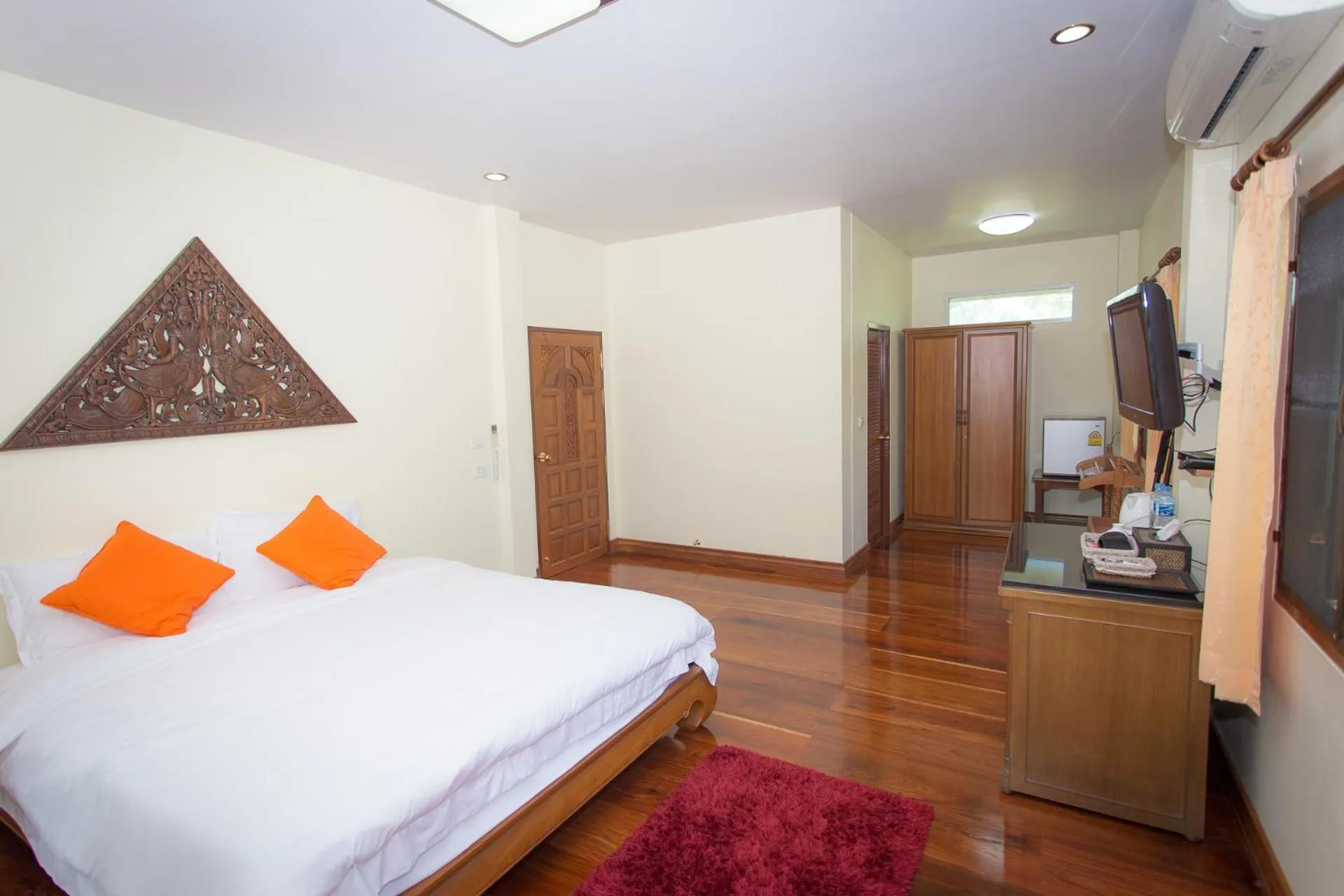 Bed in Thararin Villa