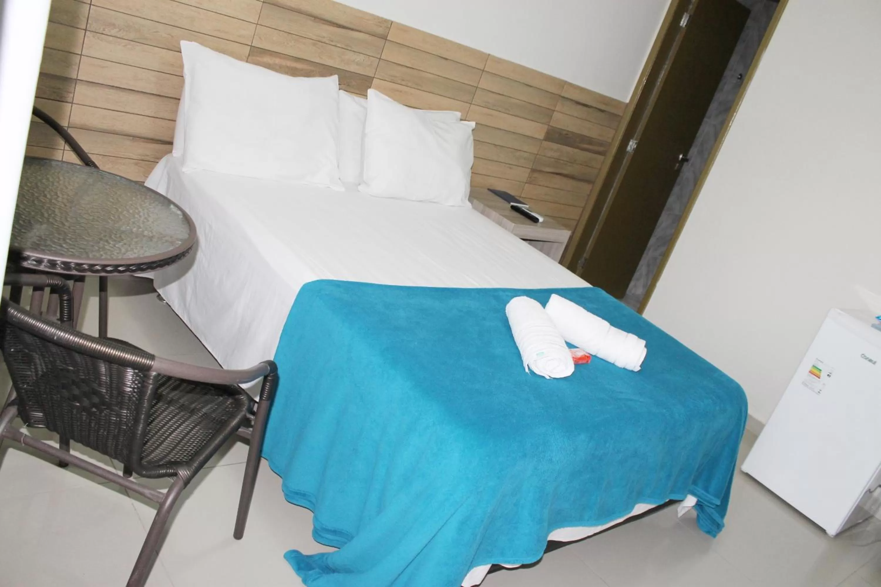 Bed in Pousada Das Palmeiras