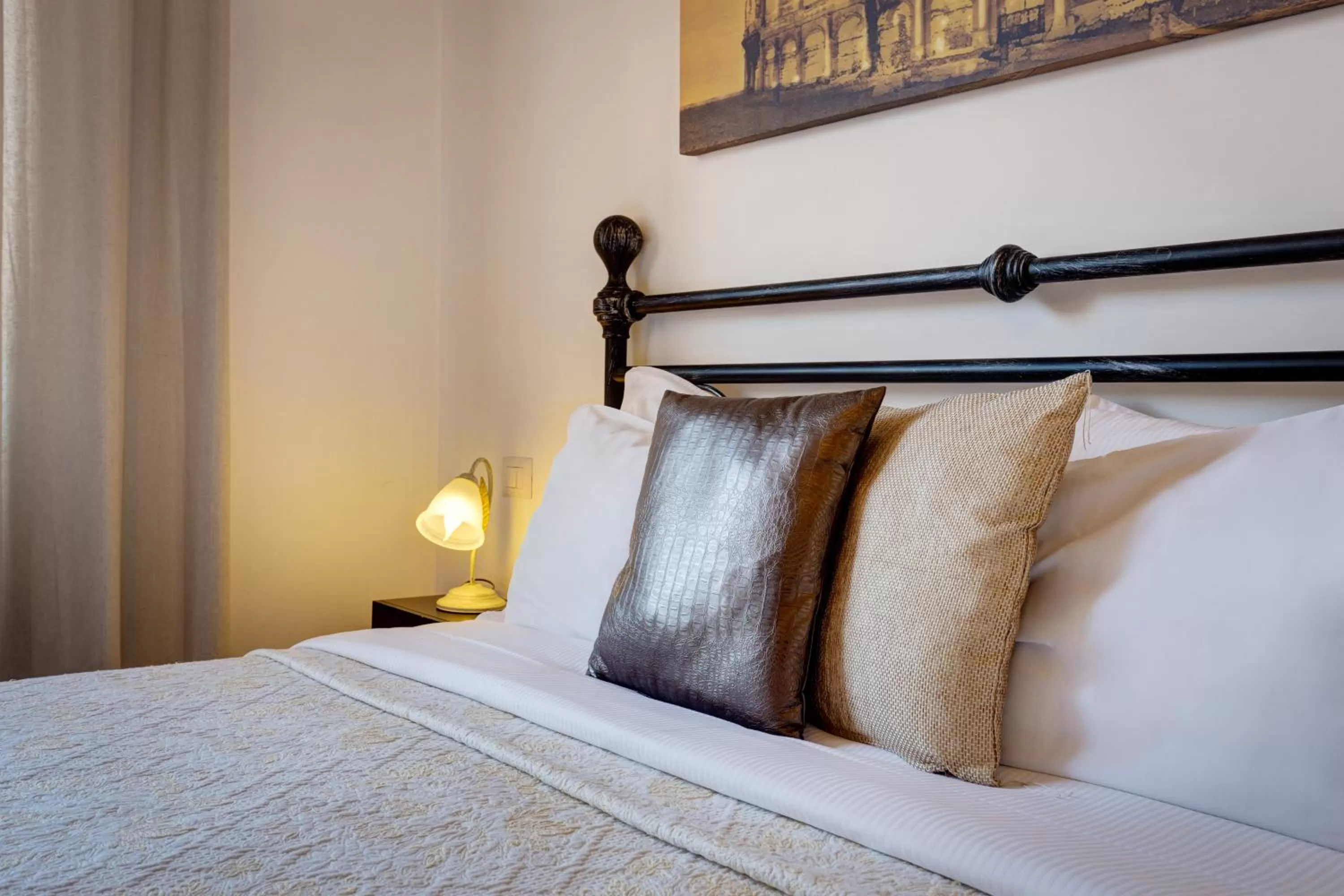 Decorative detail, Bed in Little Rhome Suites