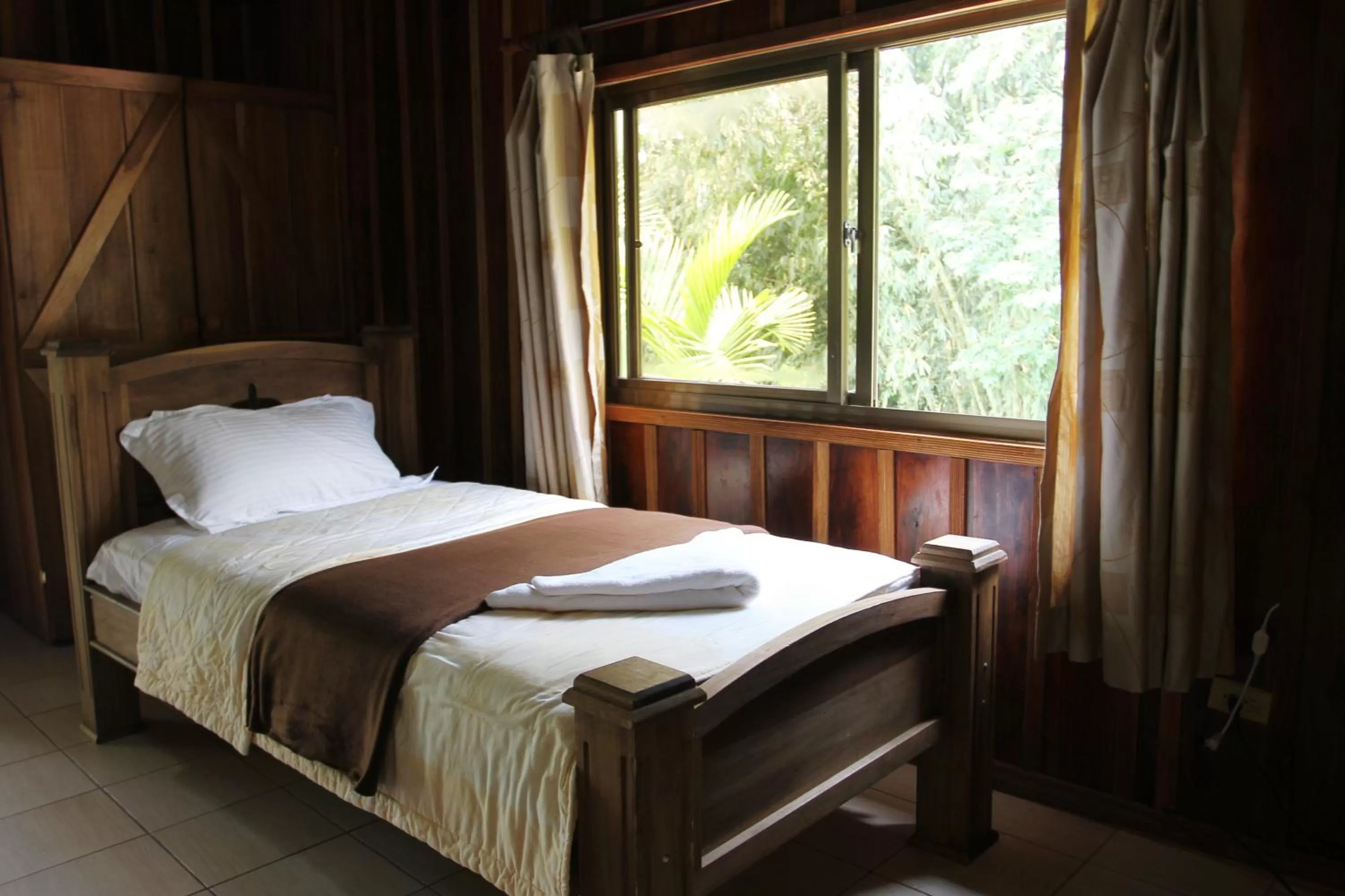 Bed in Hotel Kokoro Mineral Hot Springs