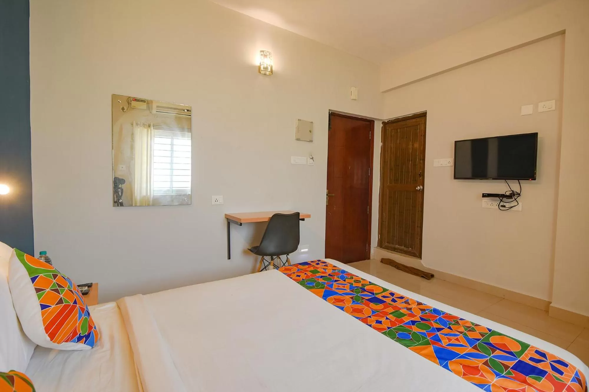 Bed in FabHotel Sasti Inn