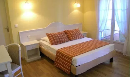 Bed in Auberge les Oliviers