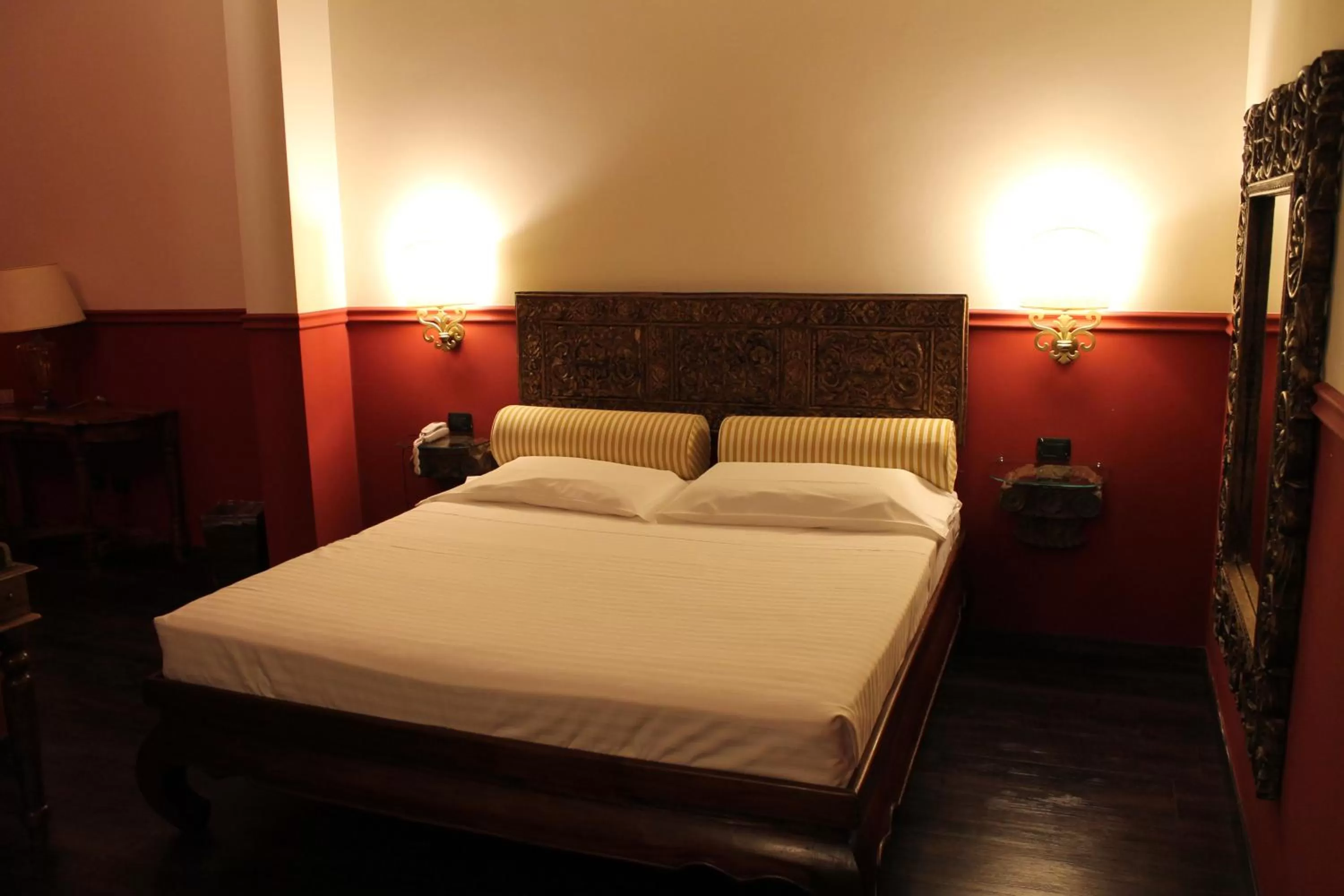 Bed in Hotel Don Carlo