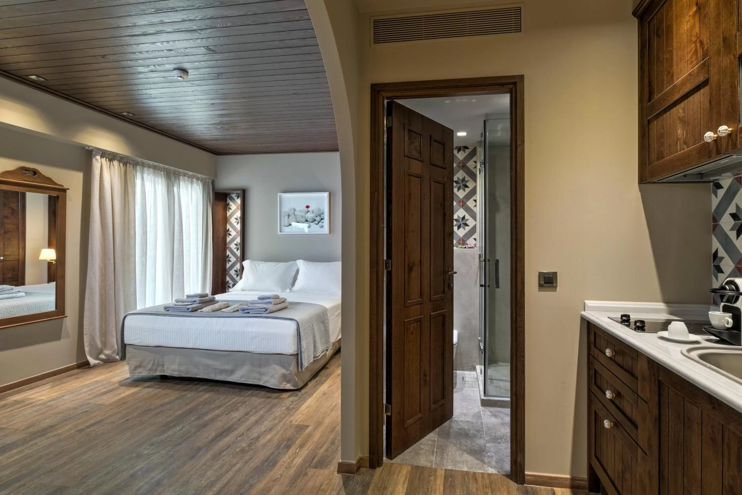 Kitchen or kitchenette, Bed in Estia Boutique Apartments