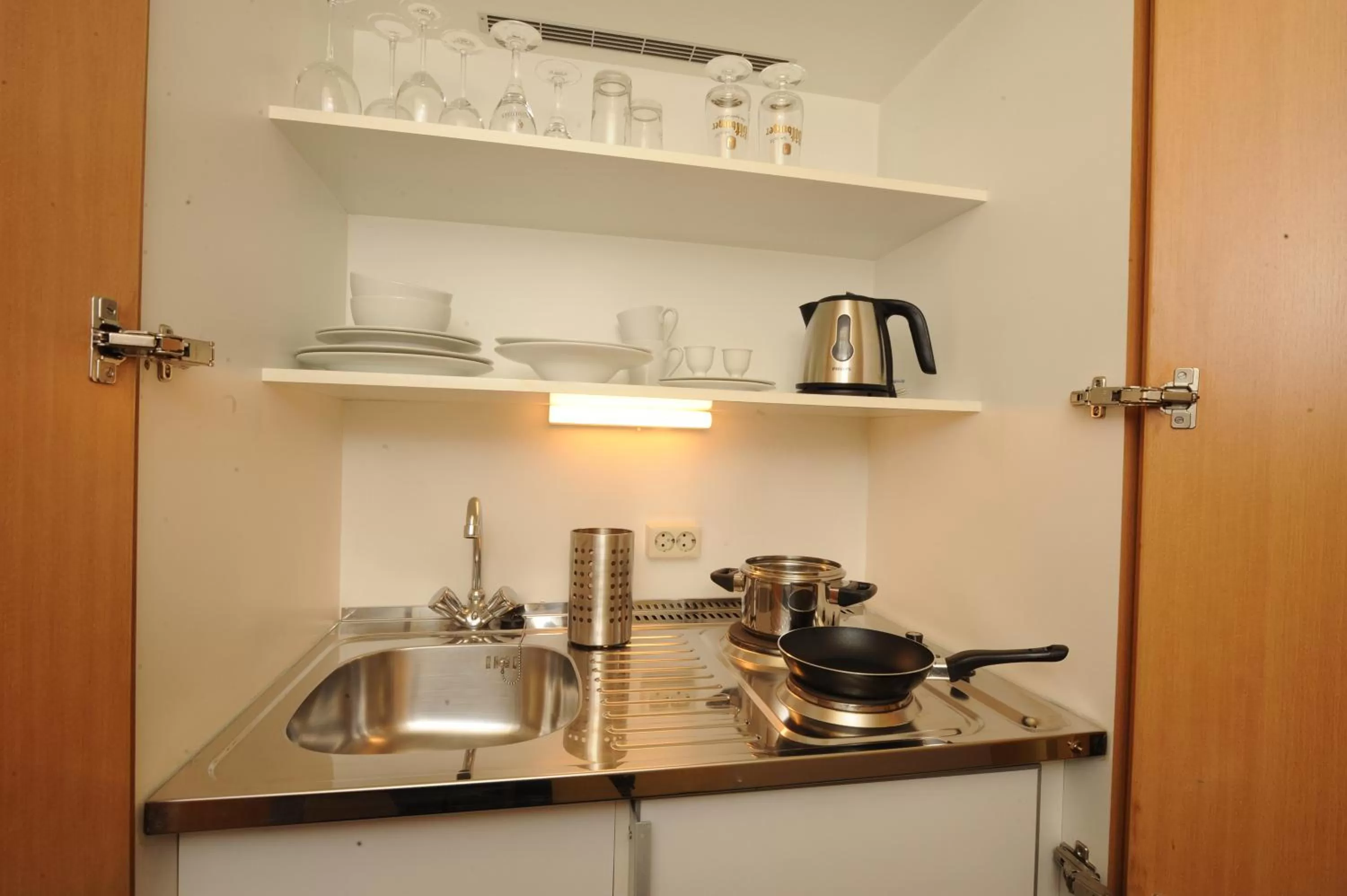 Kitchen or kitchenette in Asgard Hotel