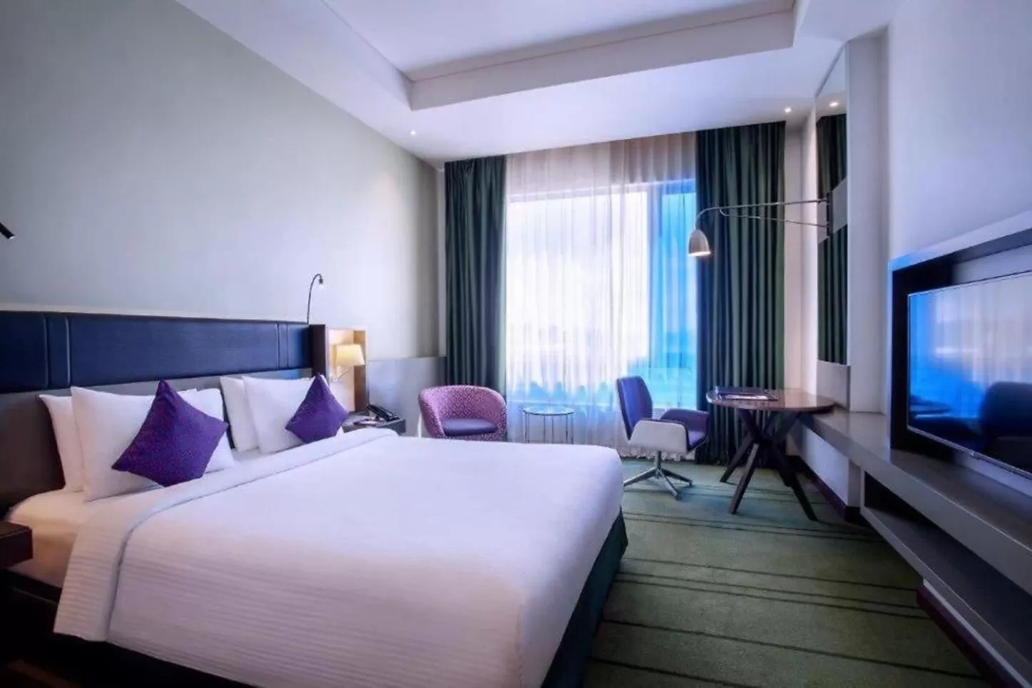 Bed in Avangio Hotel