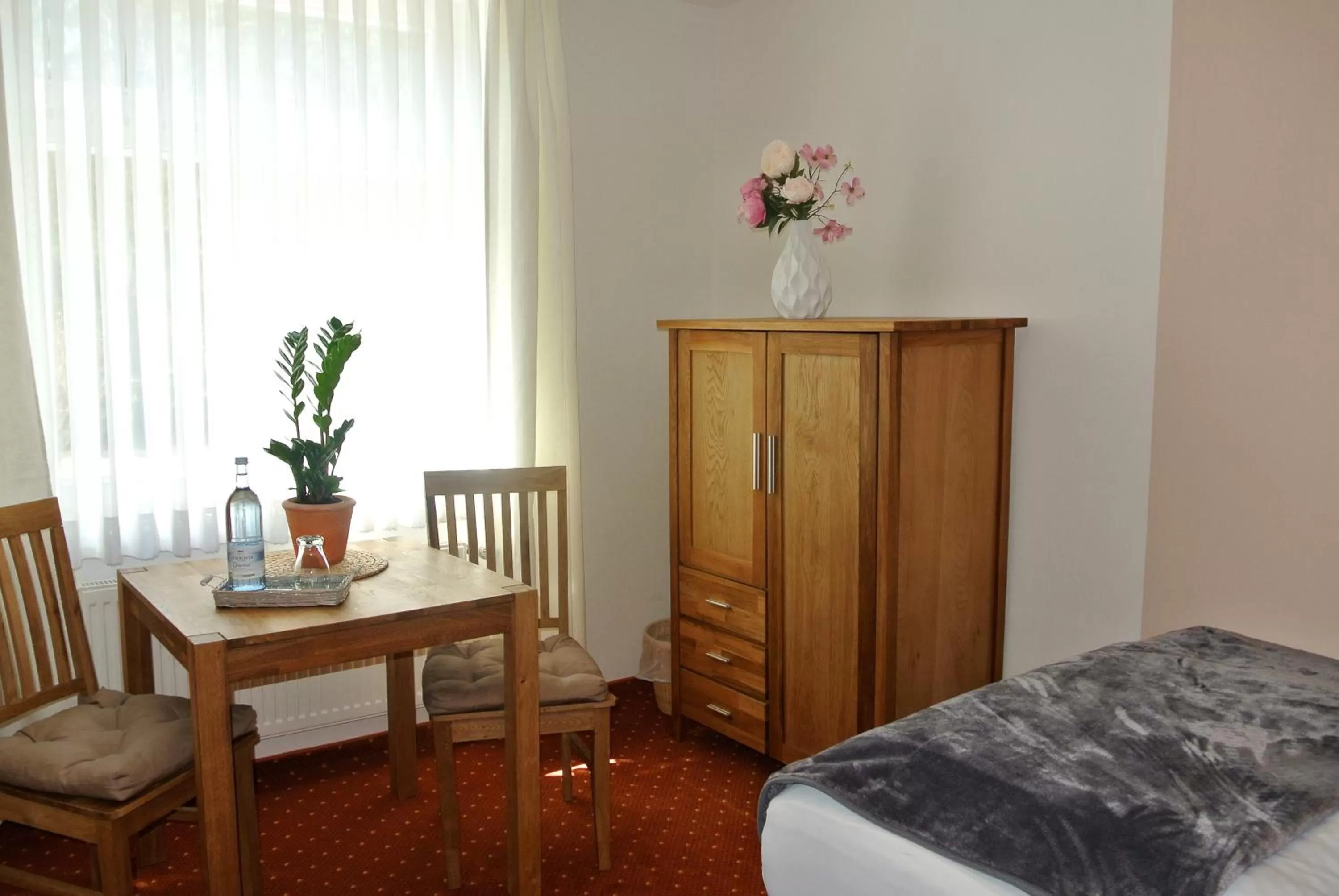 Photo of the whole room, Bed in Seehotel Lindenhof