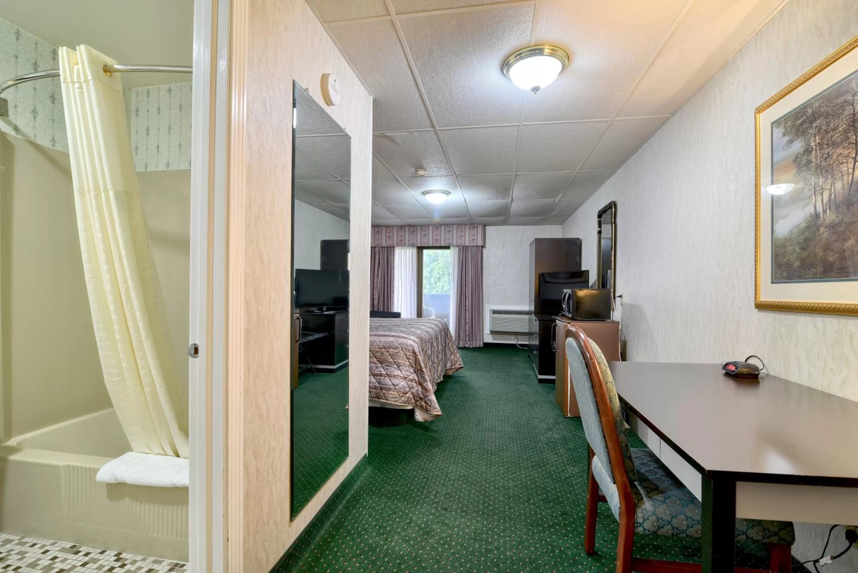 Bedroom, Bed in Roosevelt Inn & Suites Saratoga Springs