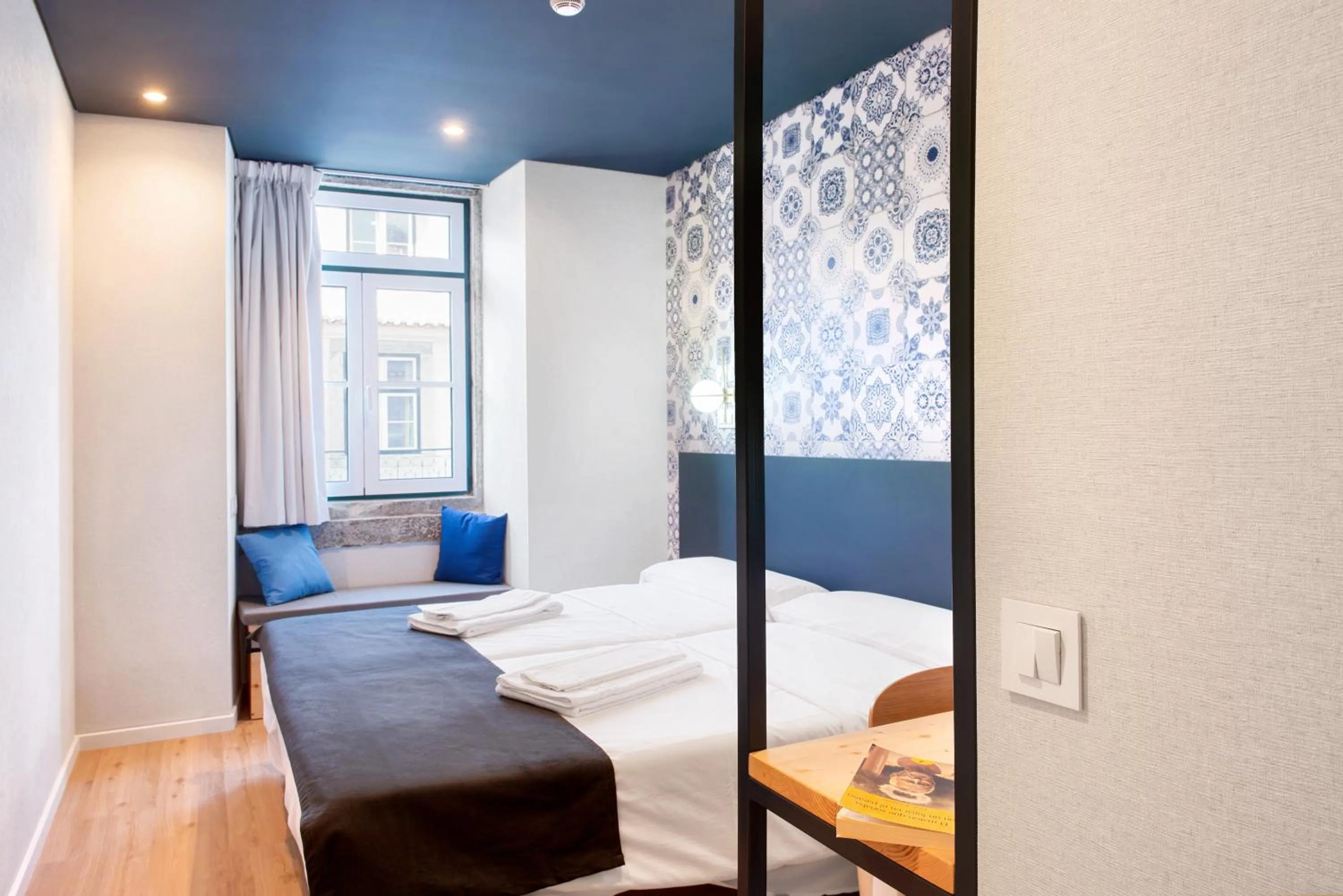 Photo of the whole room, Bed in The Central House Lisbon Baixa