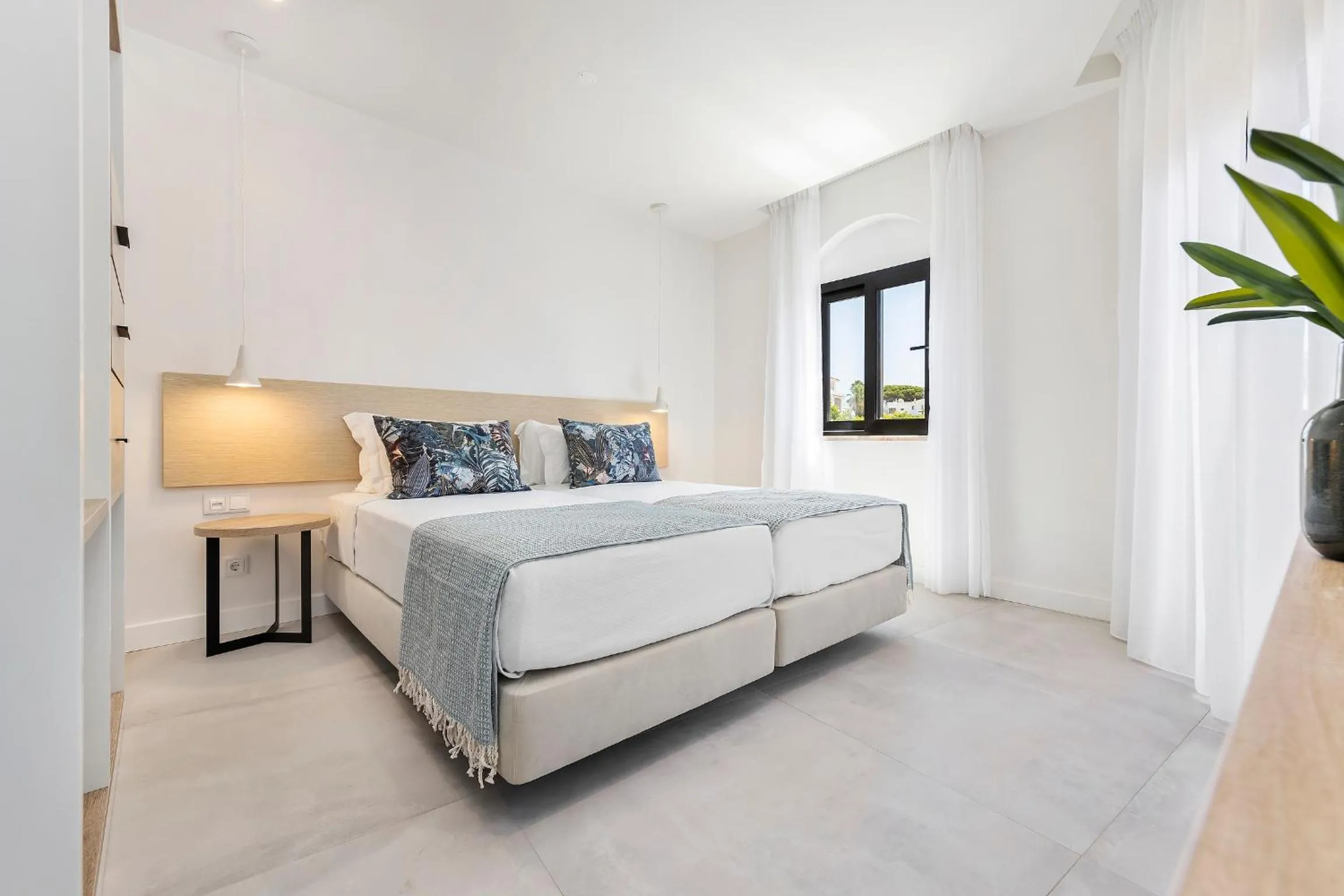 Bed in Clube Maria Luisa